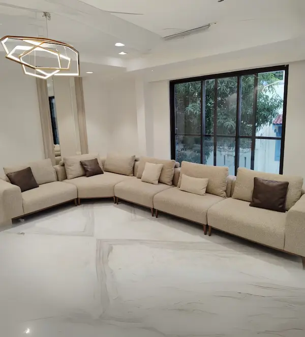 Curved sectional sofa with textured upholstery and continuous seating