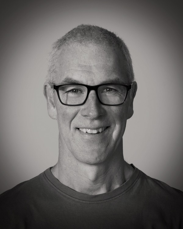 headshot of female in bright background