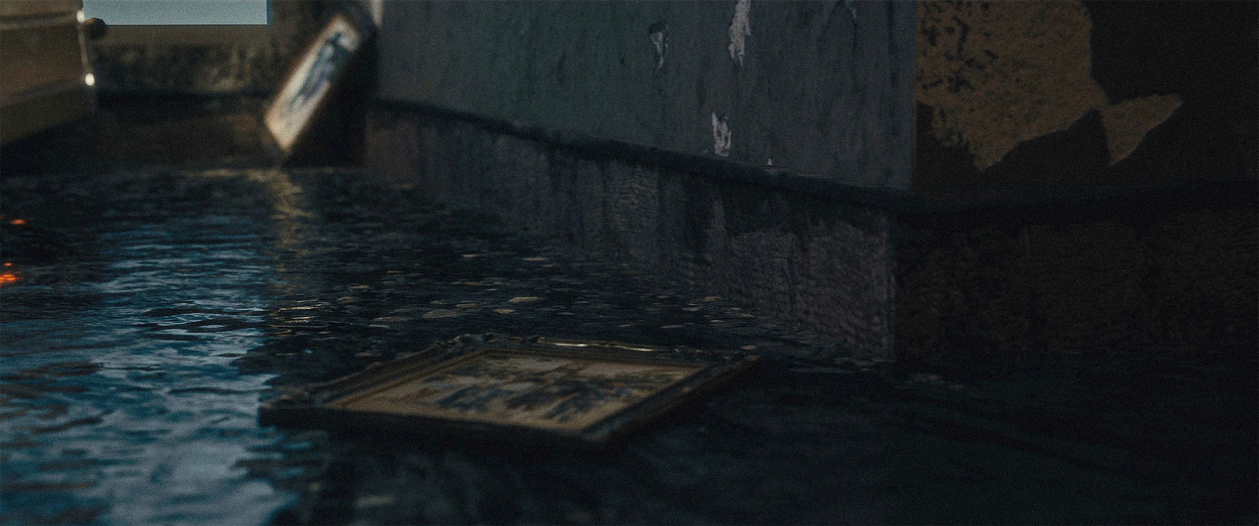 closeup of a man writing in a journal