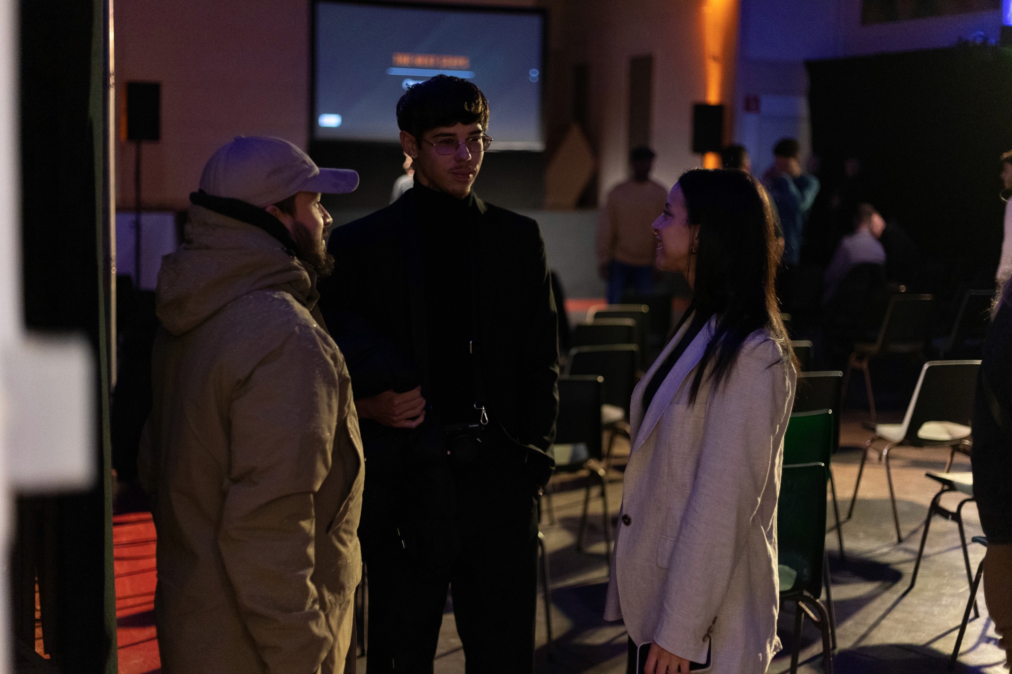 Group of men standing with Sufboard
