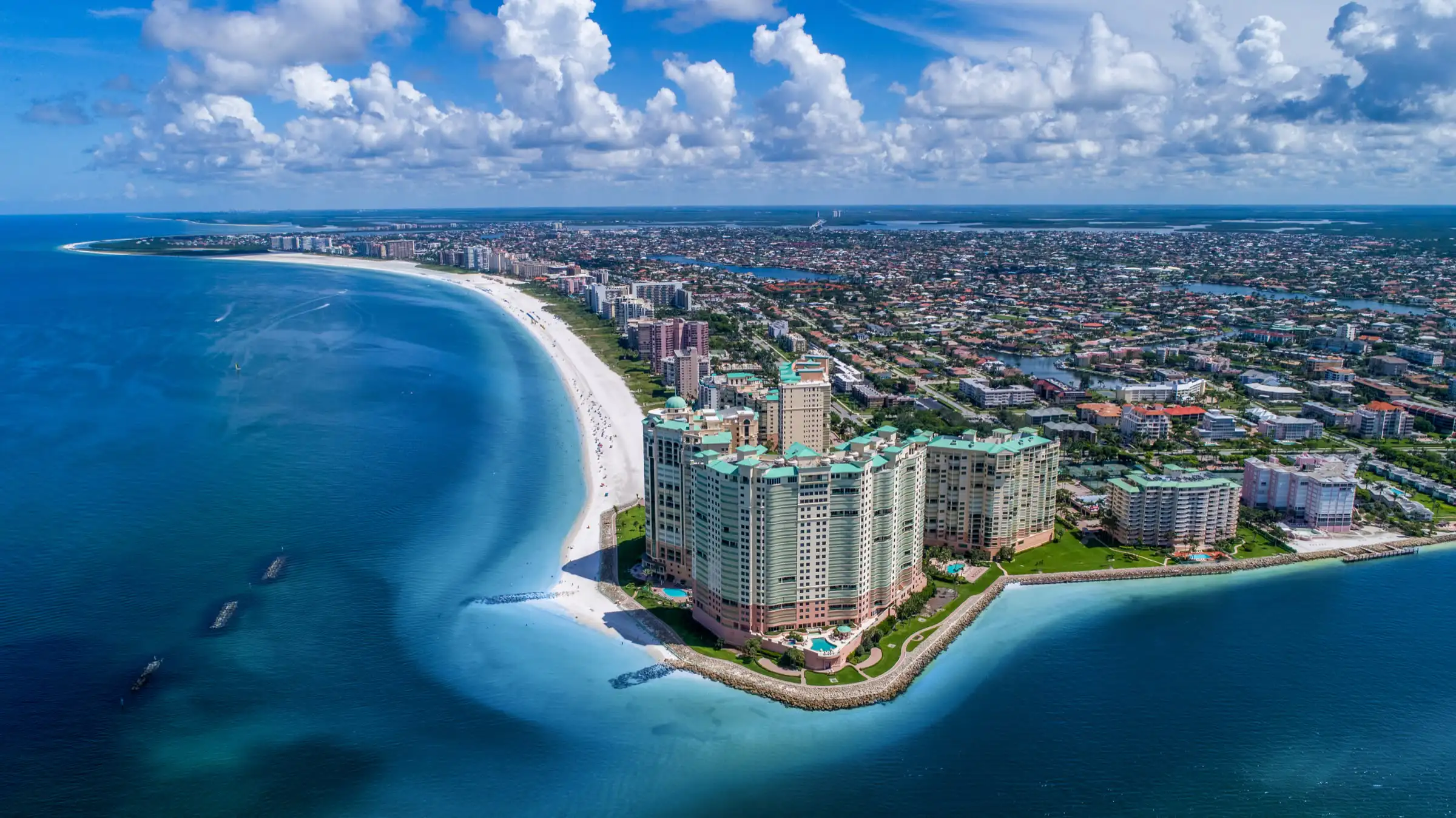 Back view of a stunning home in Park Plaza, Marco Island, featuring hurricane-resistant windows designed for coastal protection.