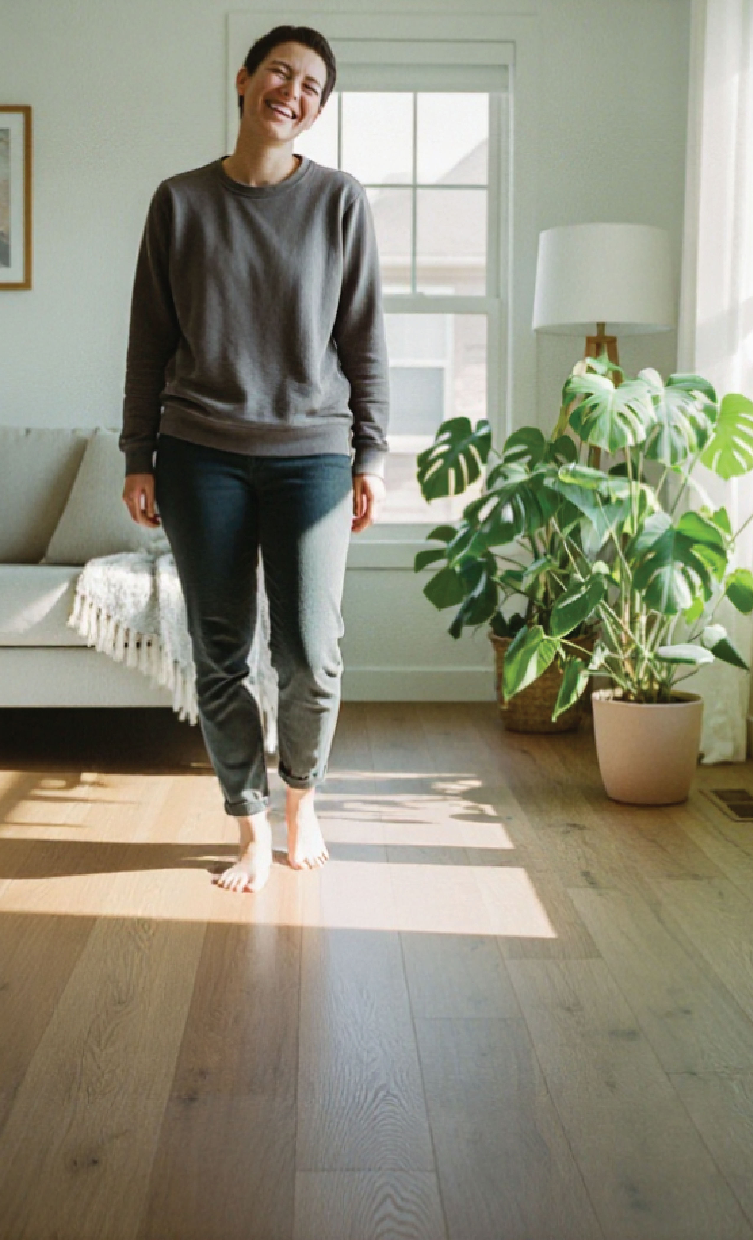 Barefoot walking on warm timber-look hybrid flooring in a bright Queensland living room, offering slip-resistant comfort for everyday living.