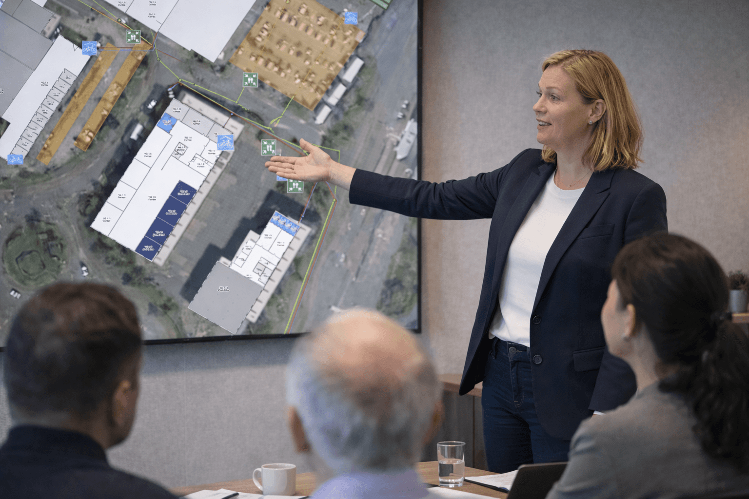two ladies looking at a laptop and smiling