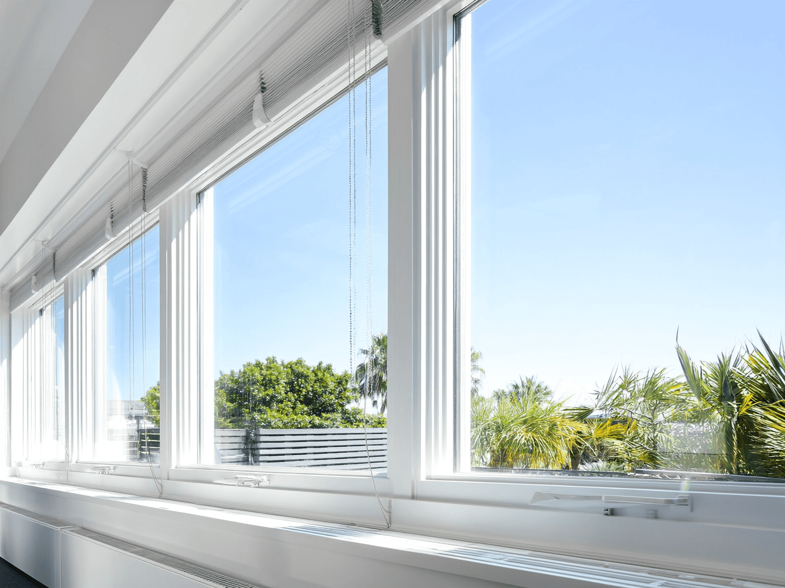 Bright modern office with spotless glass windows in Naples, Florida.