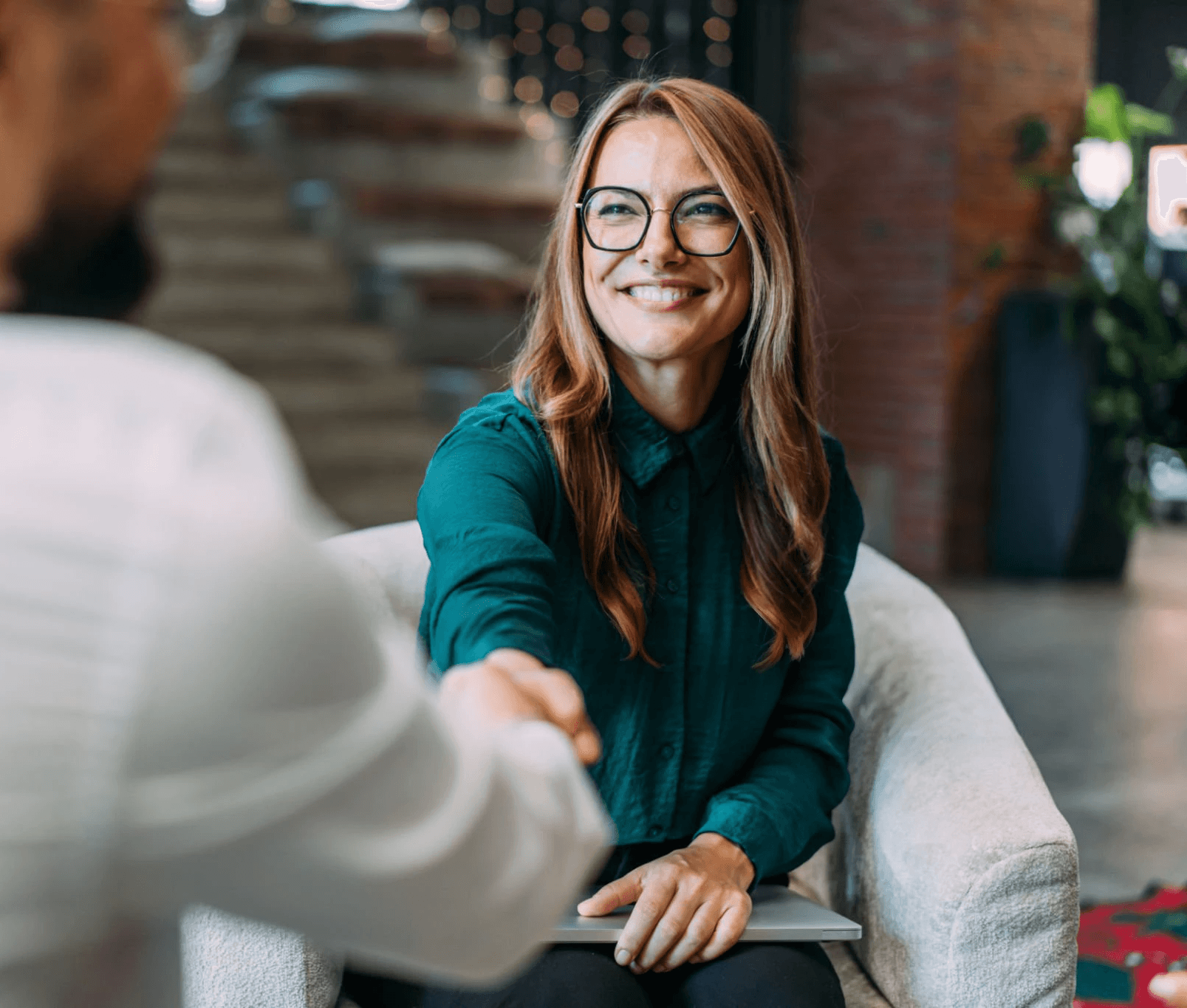 person holding Visa card and white device