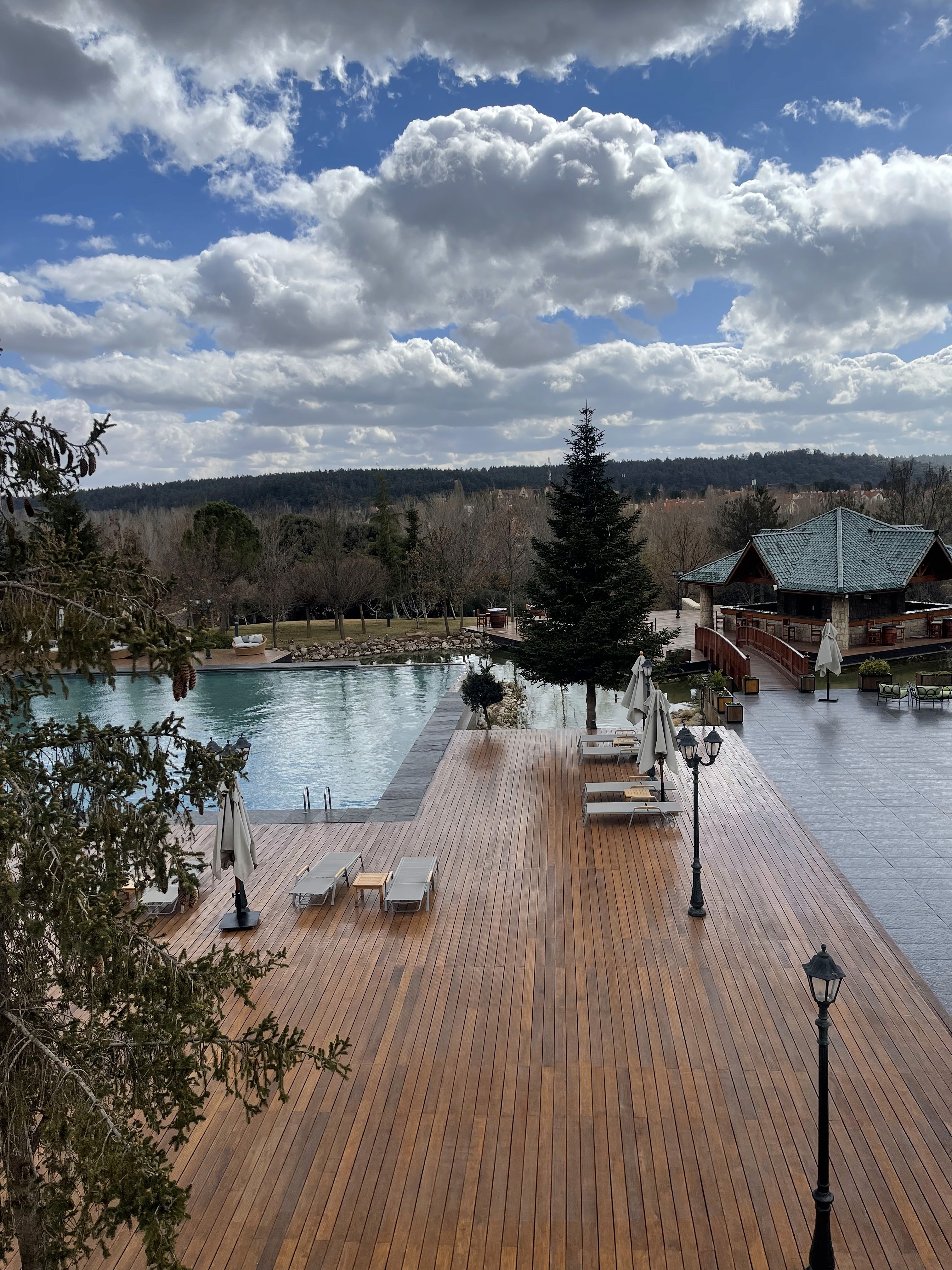 a group of people walking on a sidewalk