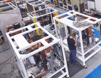 Progressive assembly automation system with snap press and clip installation stations