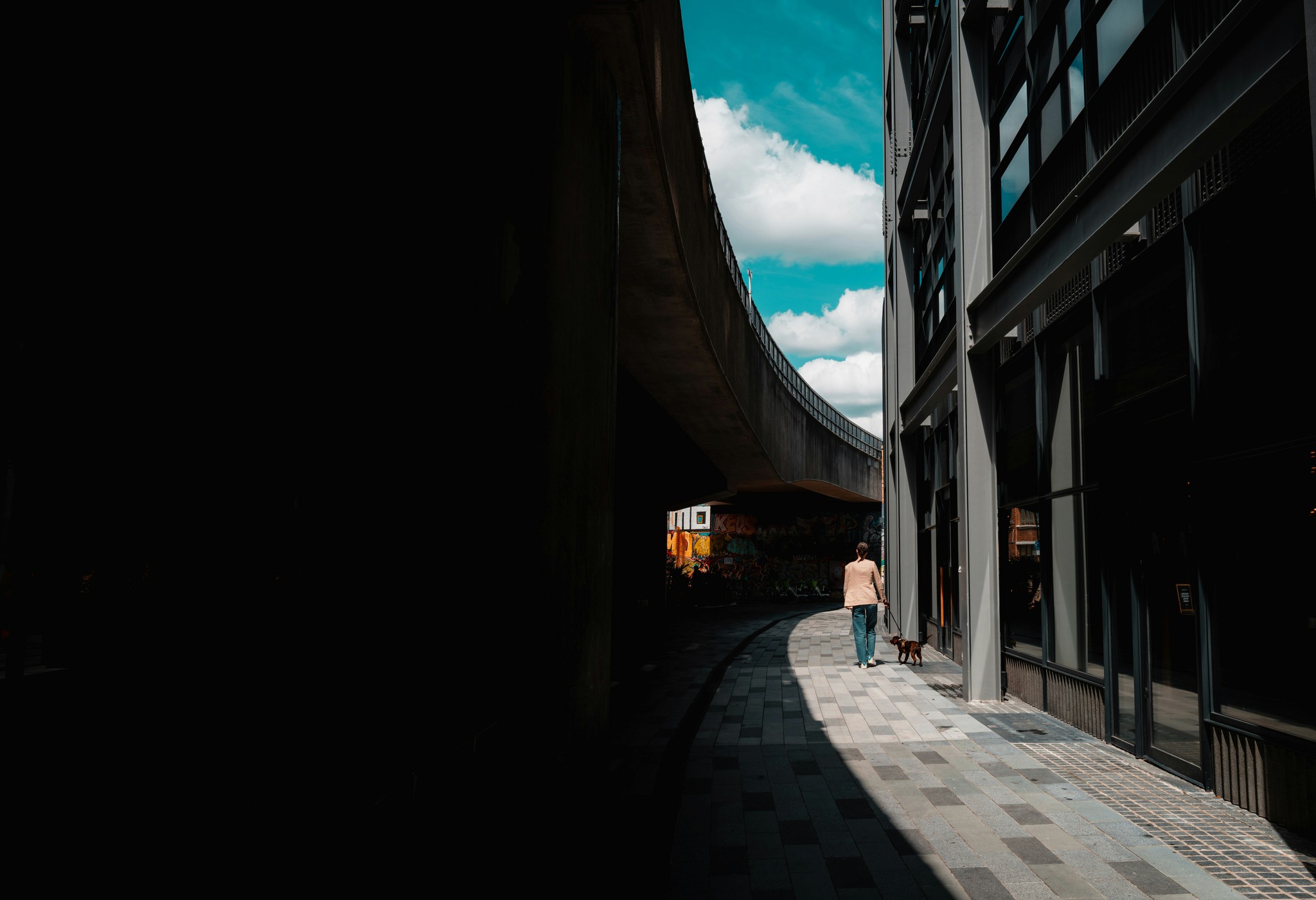 Curved bridge with harsh shadow