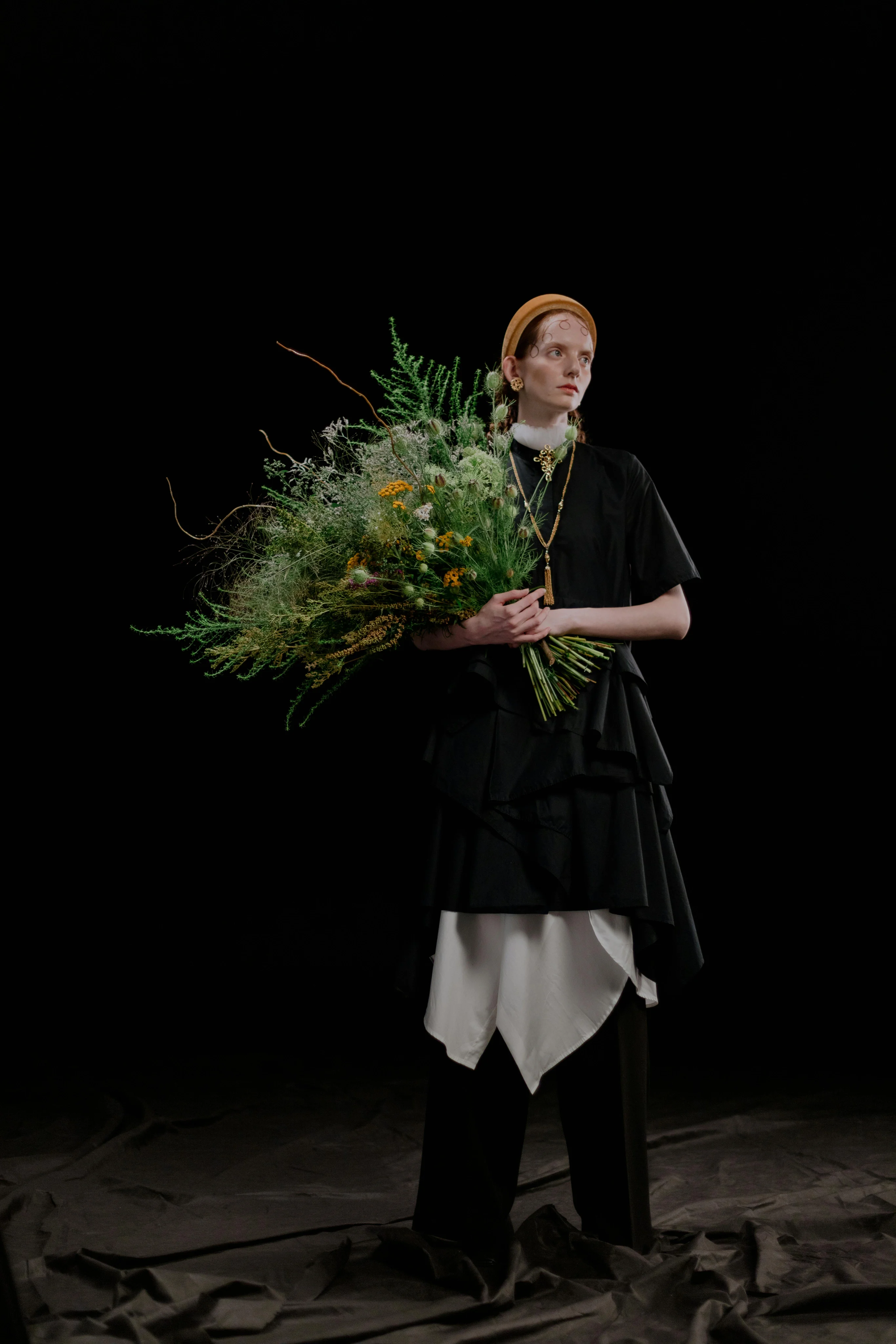 Victoria Hayes portrait with set of flowers