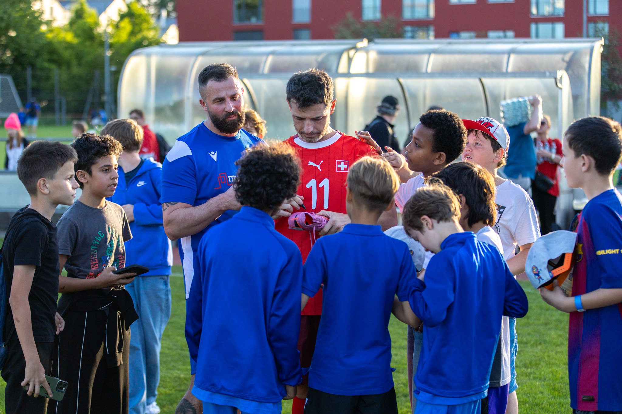 Blerim Džemaili with young FC Oerlikon/Polizei fans, Suisse Nati Legends match Sponsorenfestival 2026 Zurich-Oerlikon