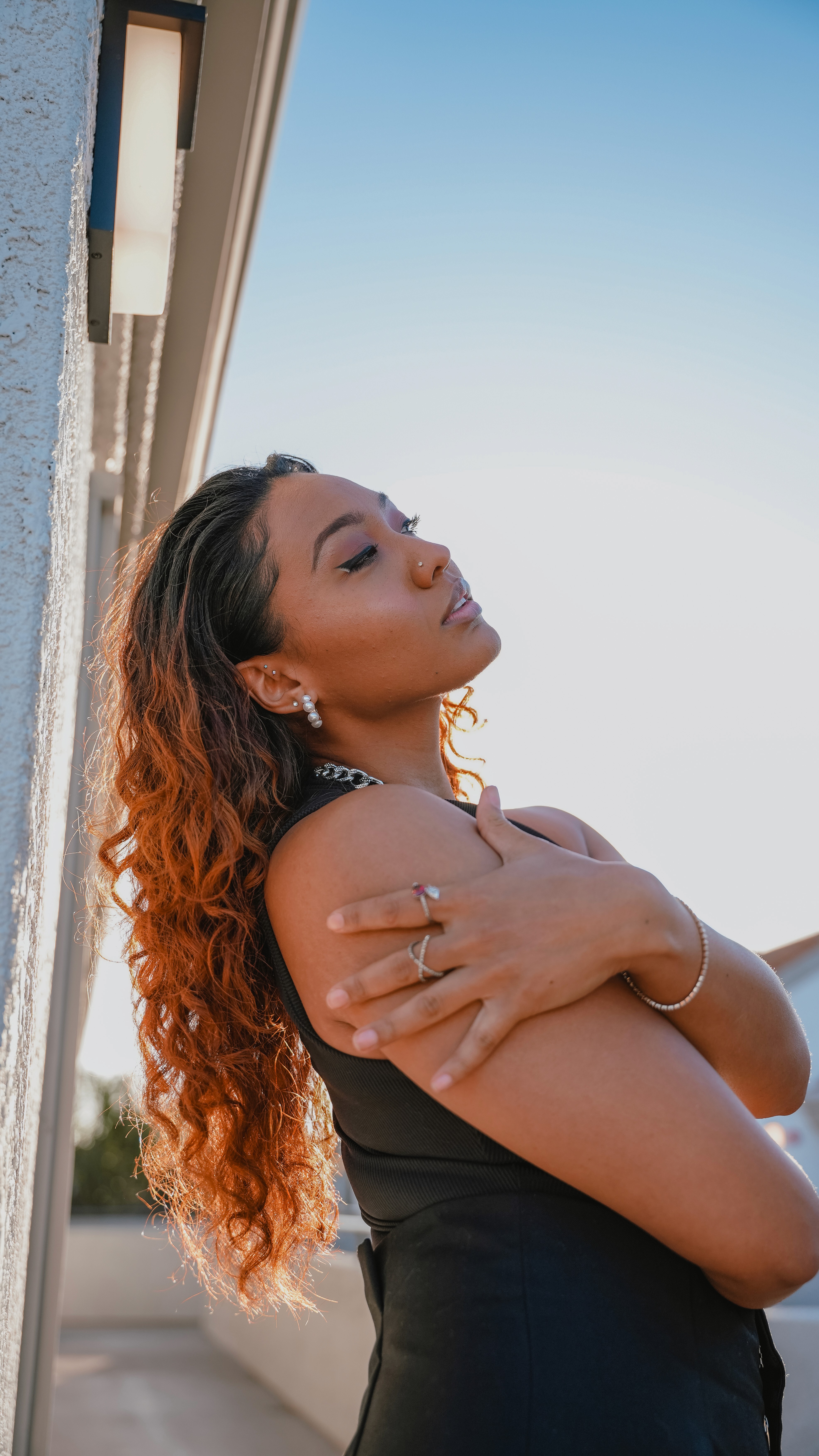 a microphone attached to a tripod on a white background