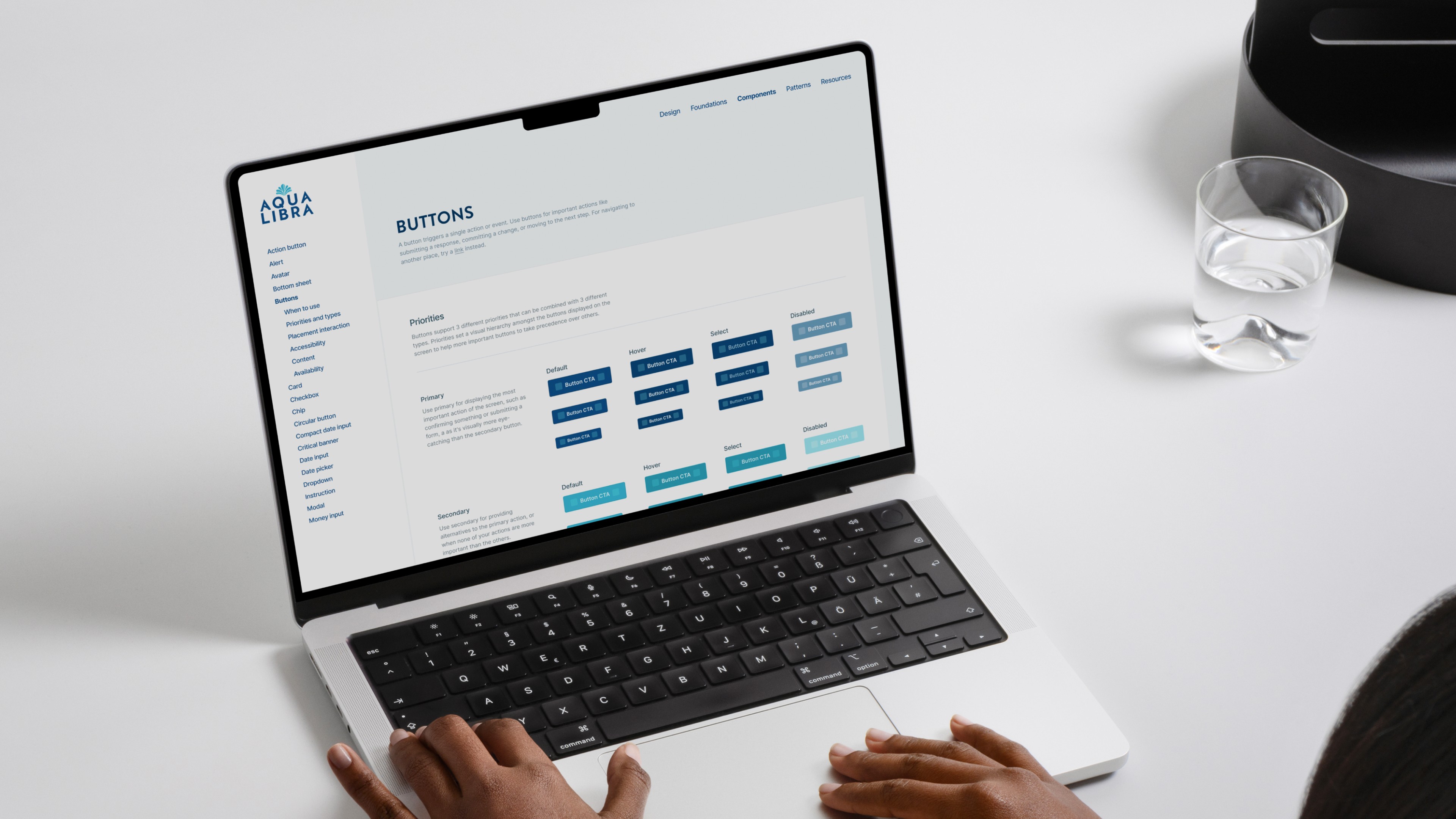 Component library view from Aqua Libra design system featuring button states and priority styles