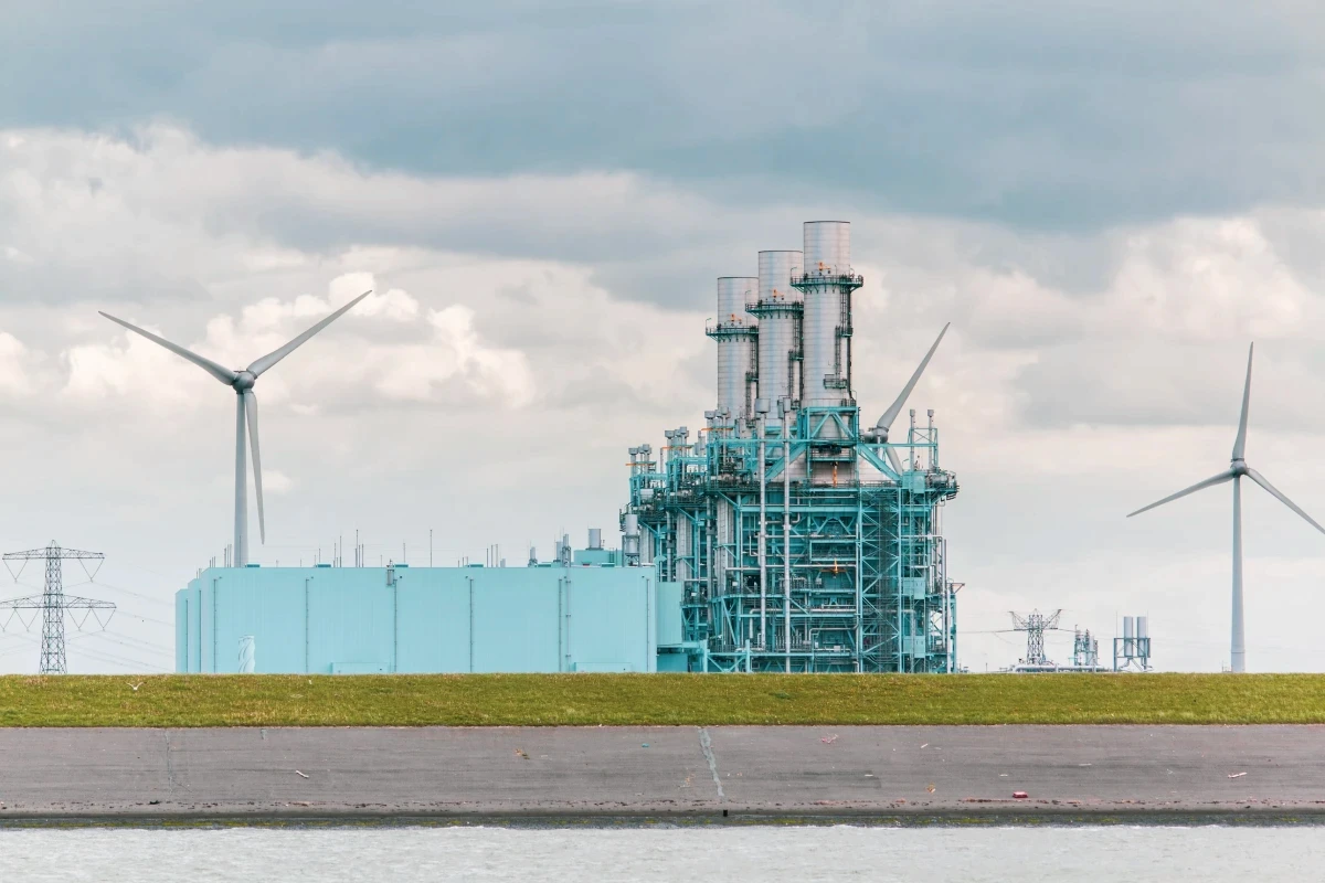 Power plant with wind turbines and towers.