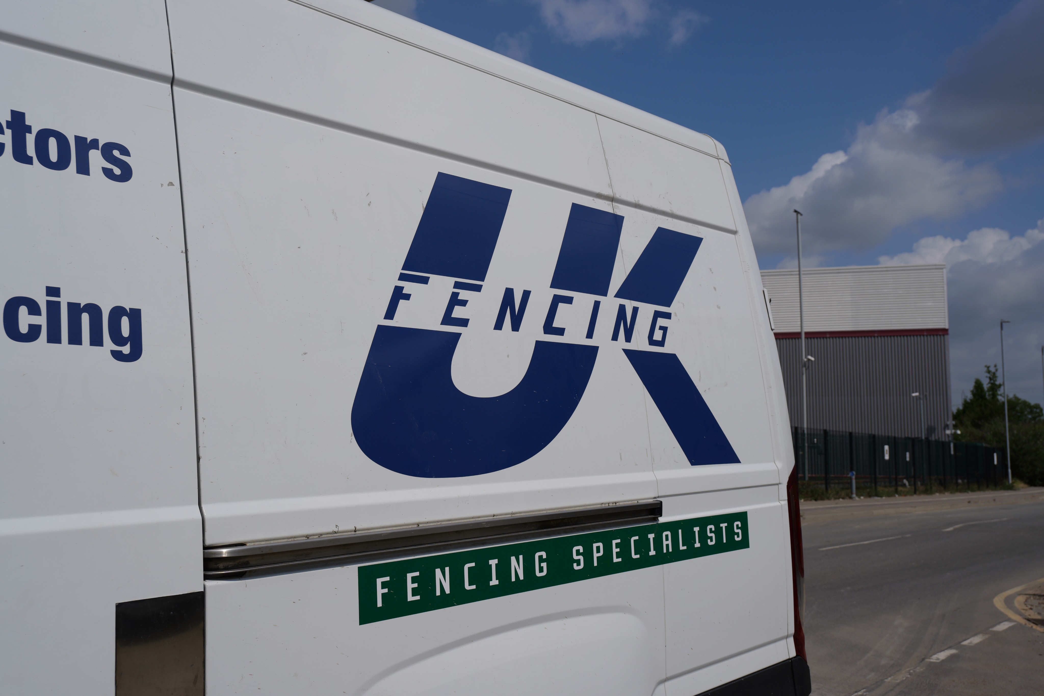 White UK Fencing Van with UK Fencing Logo on the side