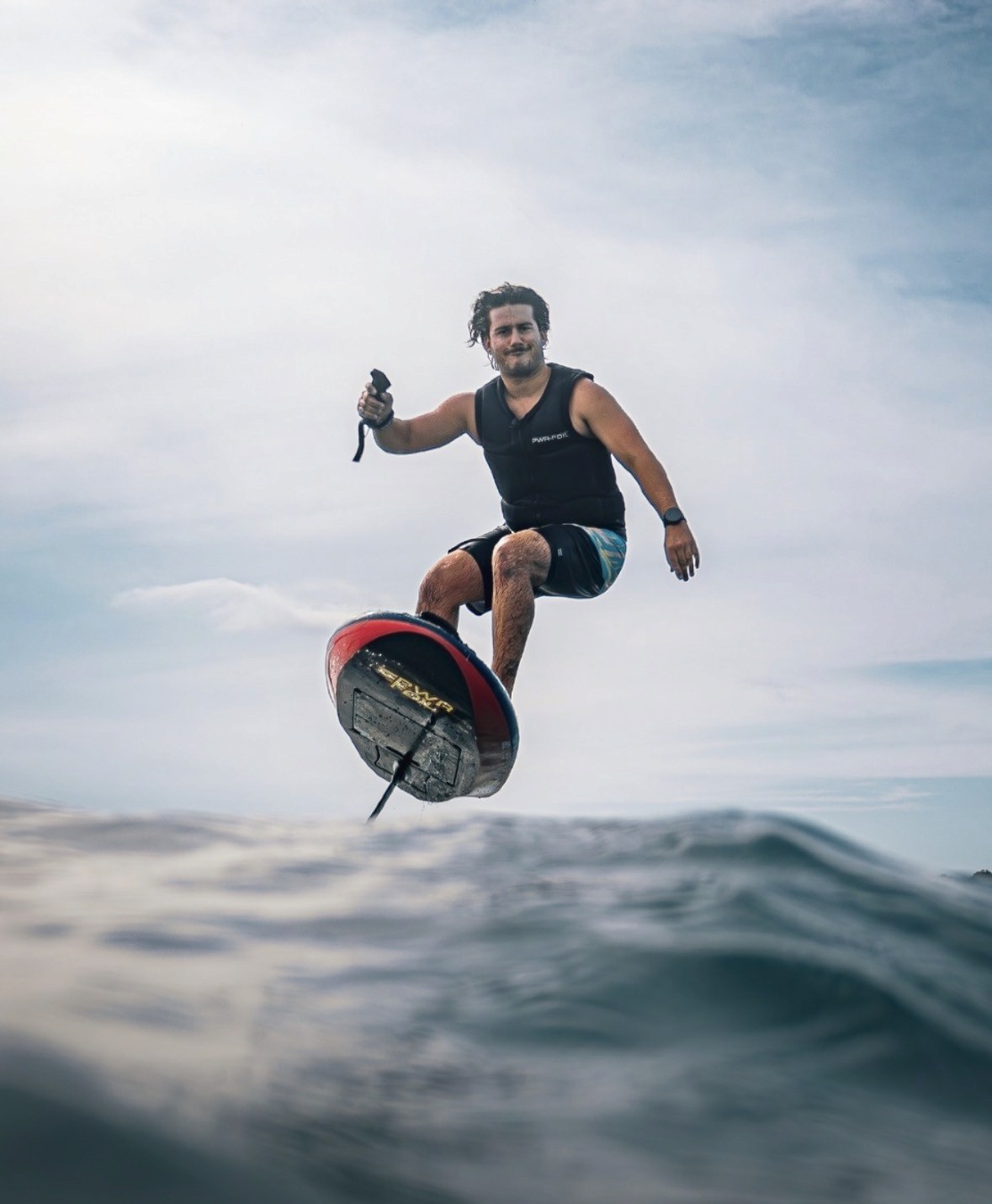 Man with surfing with paddle