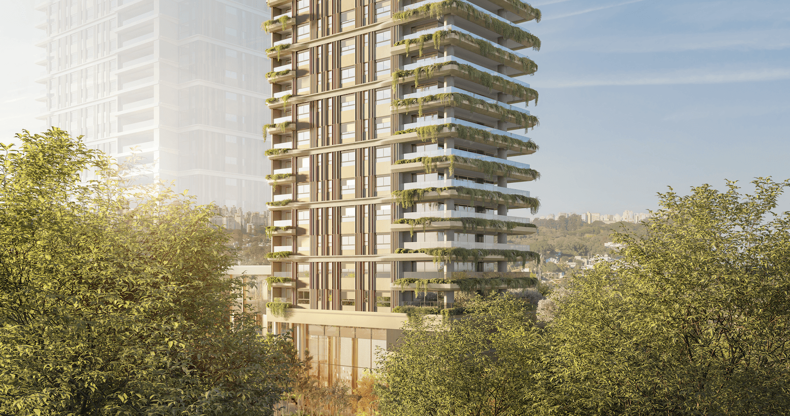 Curved modern skyscraper against a clear blue sky.