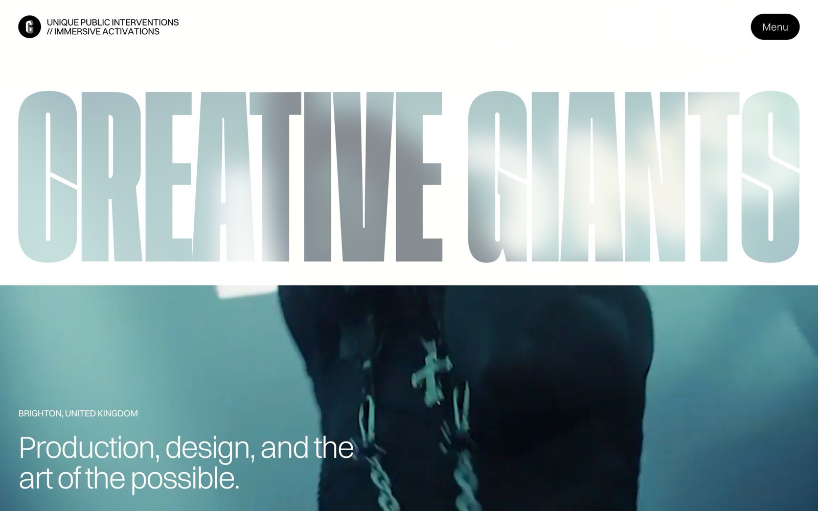 Large text "CREATIVE GIANTS" in bold, gradient style. Below, a figure in motion with text: "BRIGHTON, UNITED KINGDOM" and "Production,...
