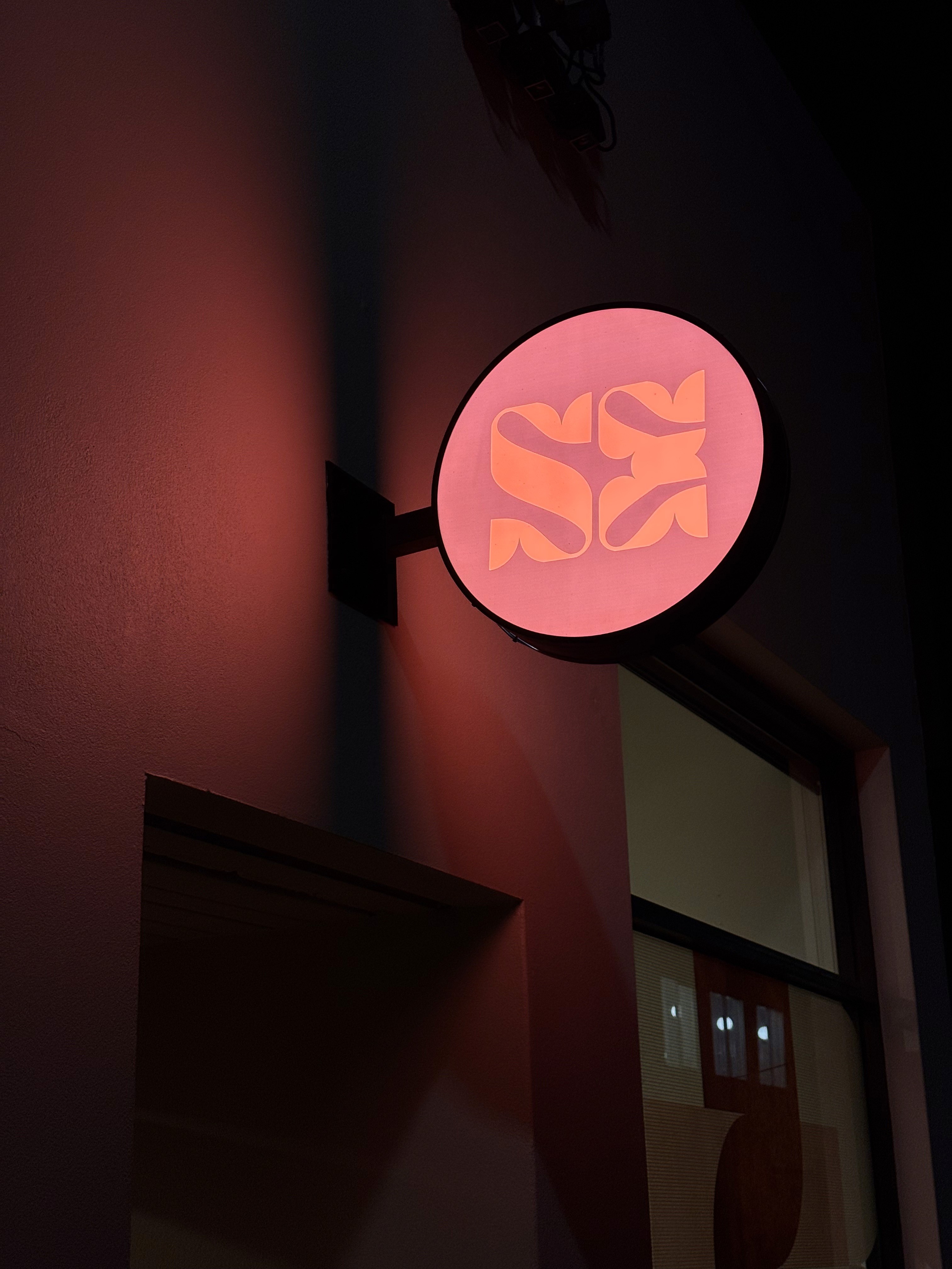 Spinal Energetics logo and sign outside the clinic