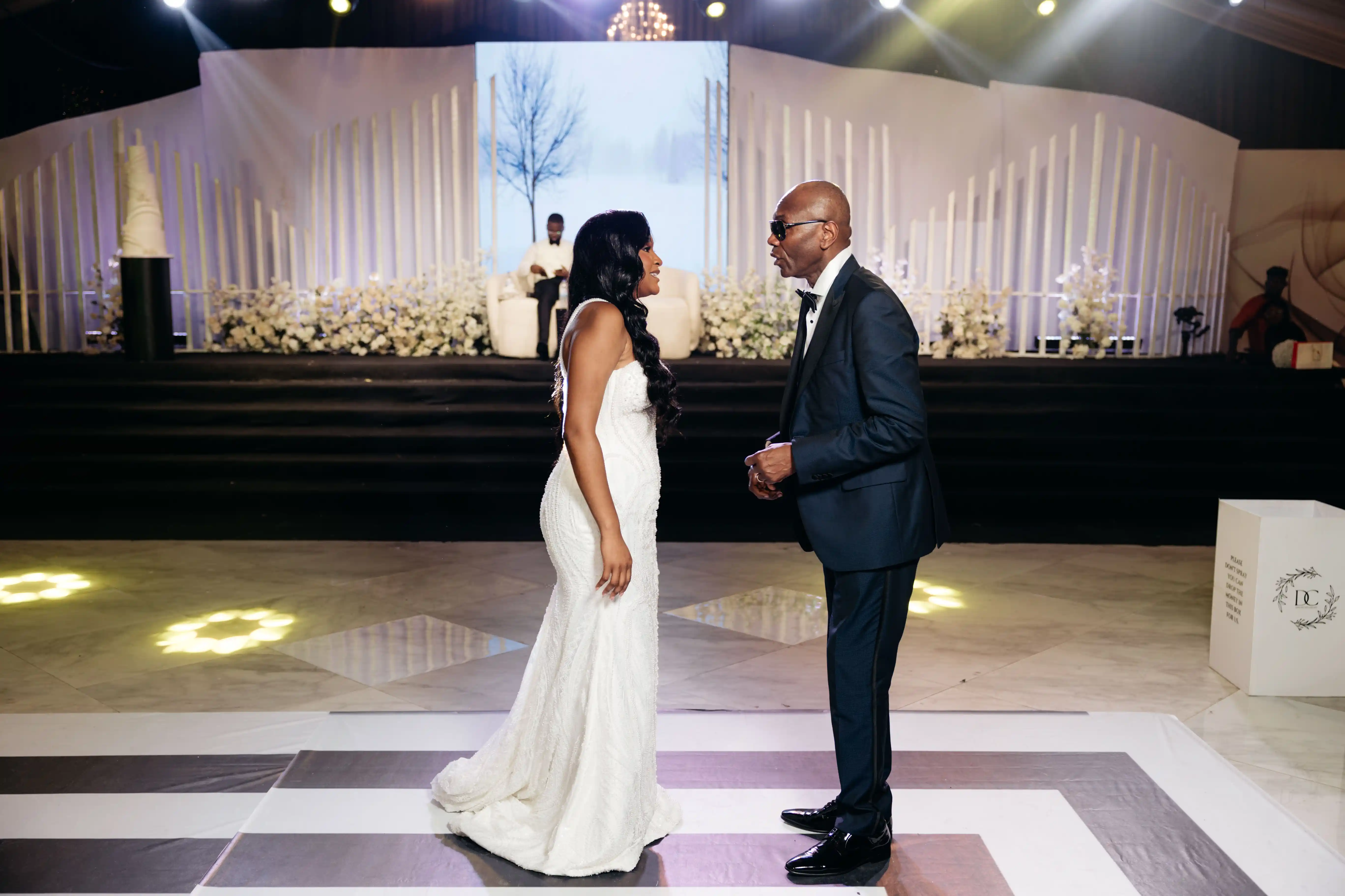 Bride and groom celebrating a luxury wedding coordinated by Victoria Brooks Events, a premium wedding planner in Nigeria.