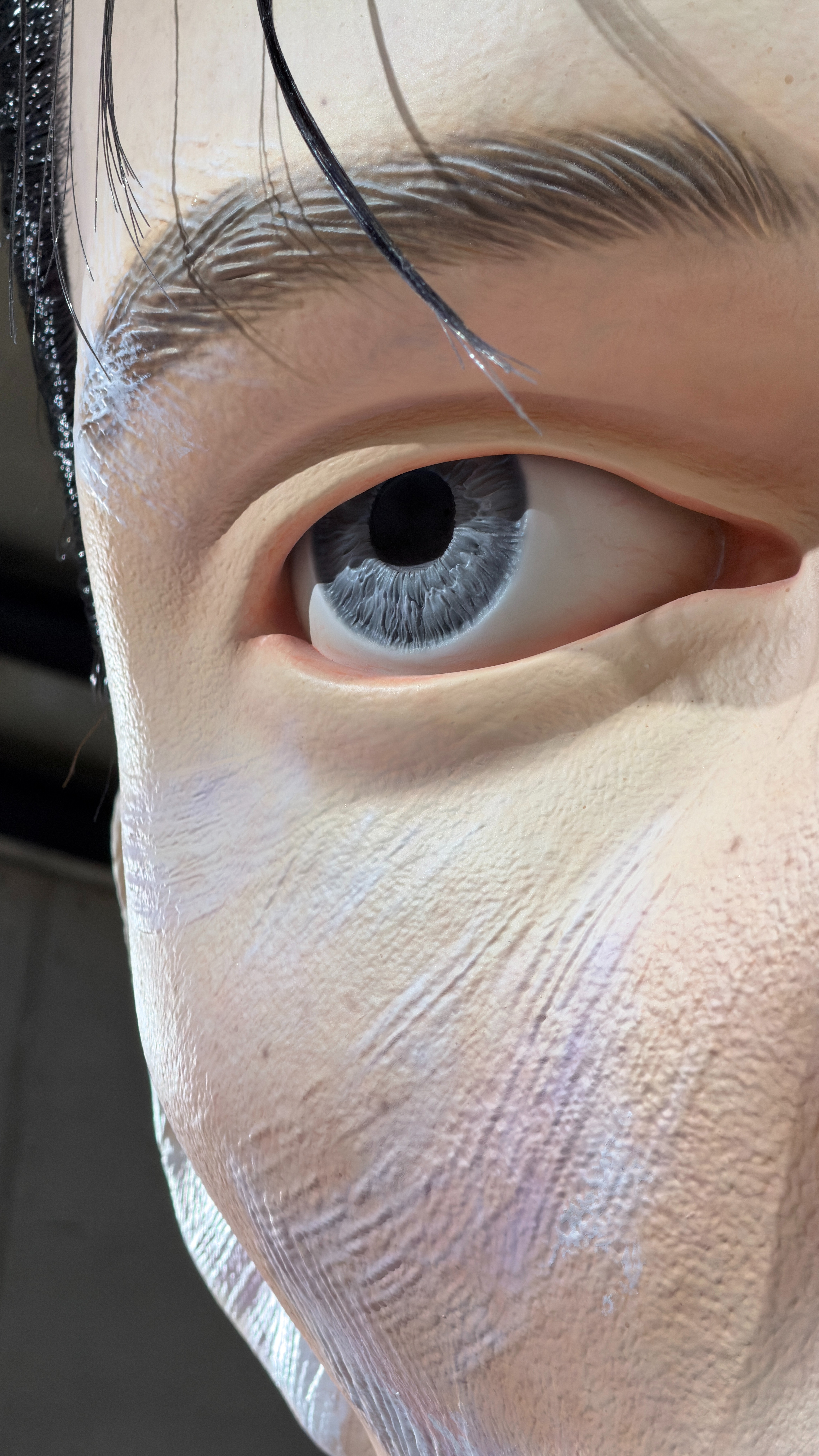 Oversized sculpted face installation at the Gentle Monster store in Seoul