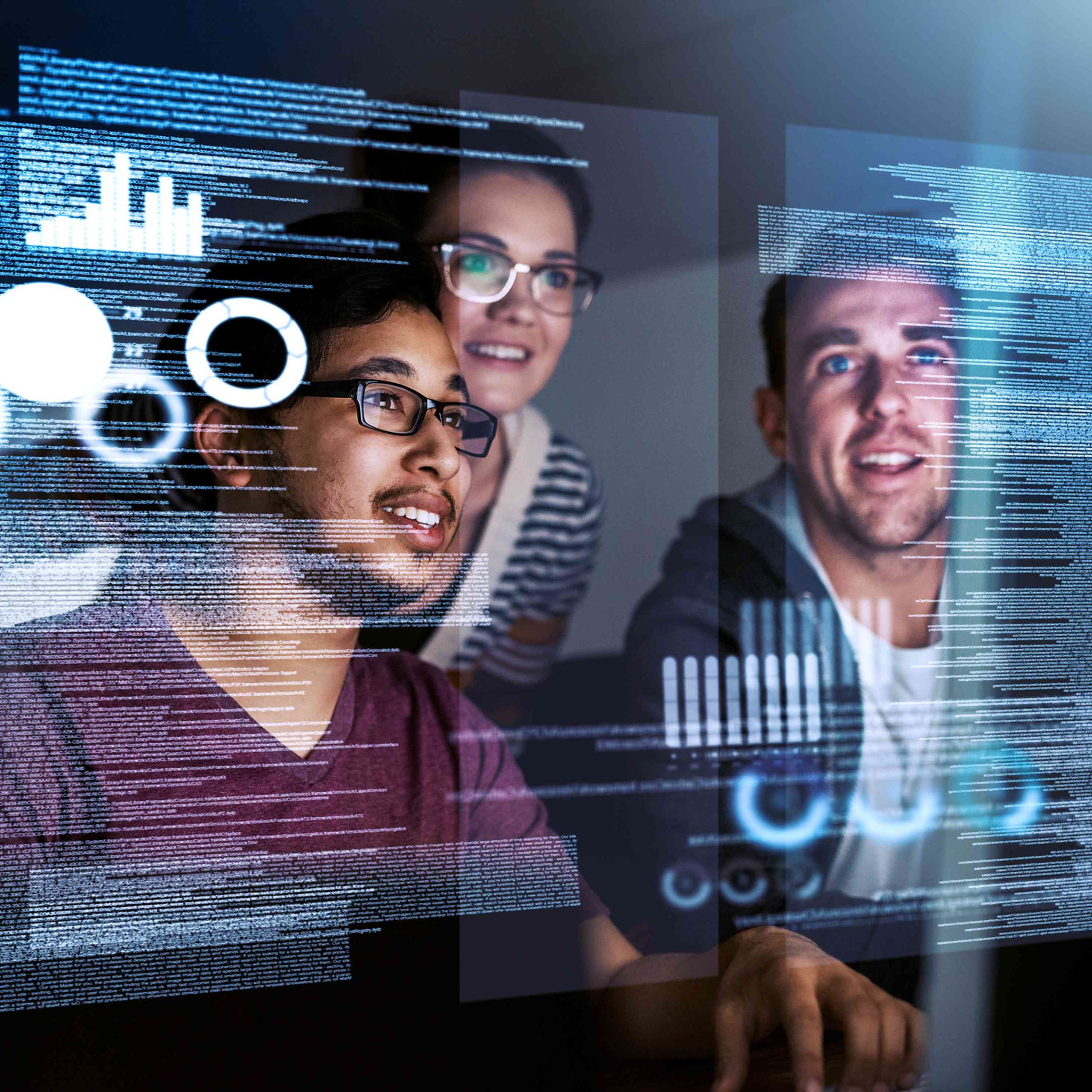 A medical professional in scrubs holding a tablet in a hospital setting, focused on the screen.