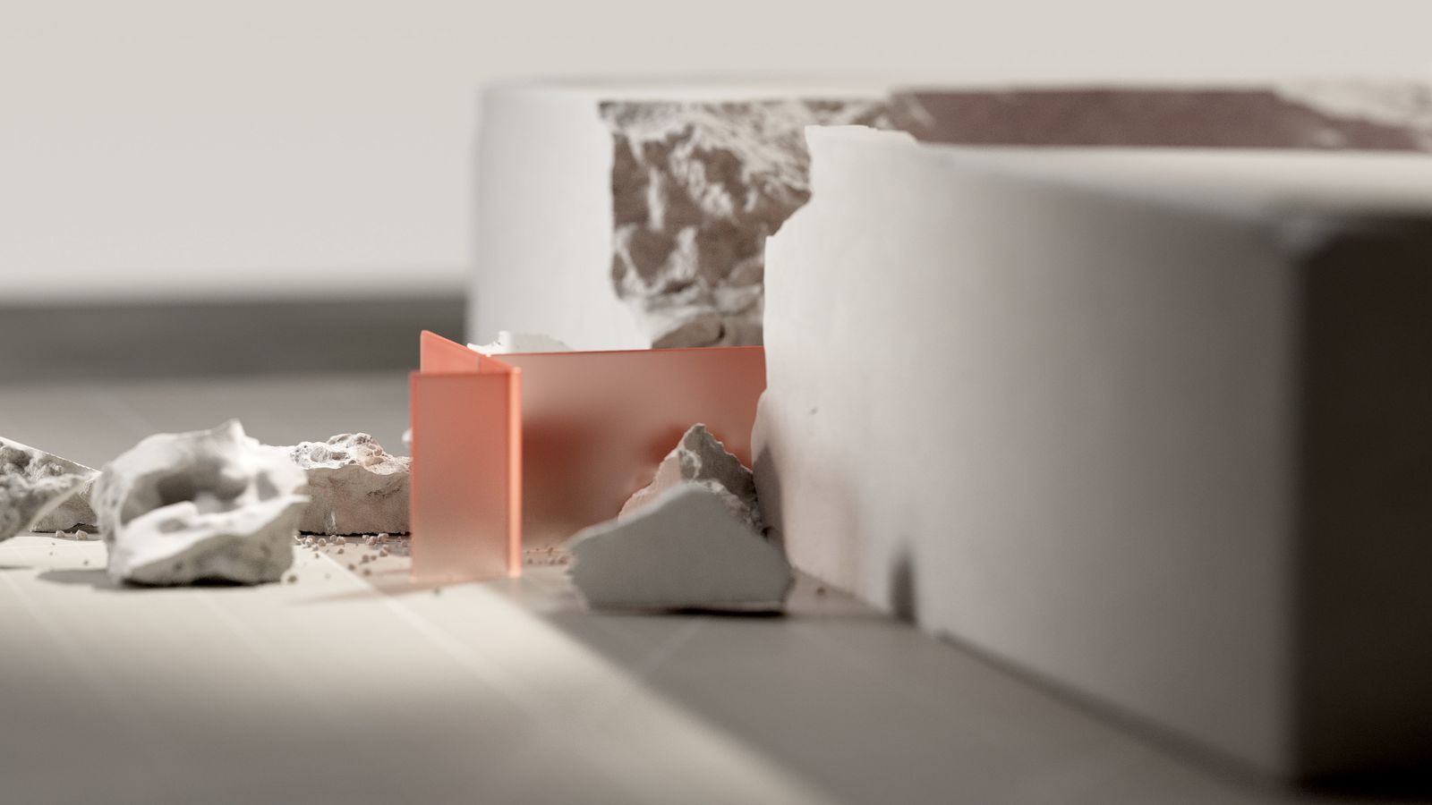 Interlocking concrete forms with a single coral block set into the arrangement
