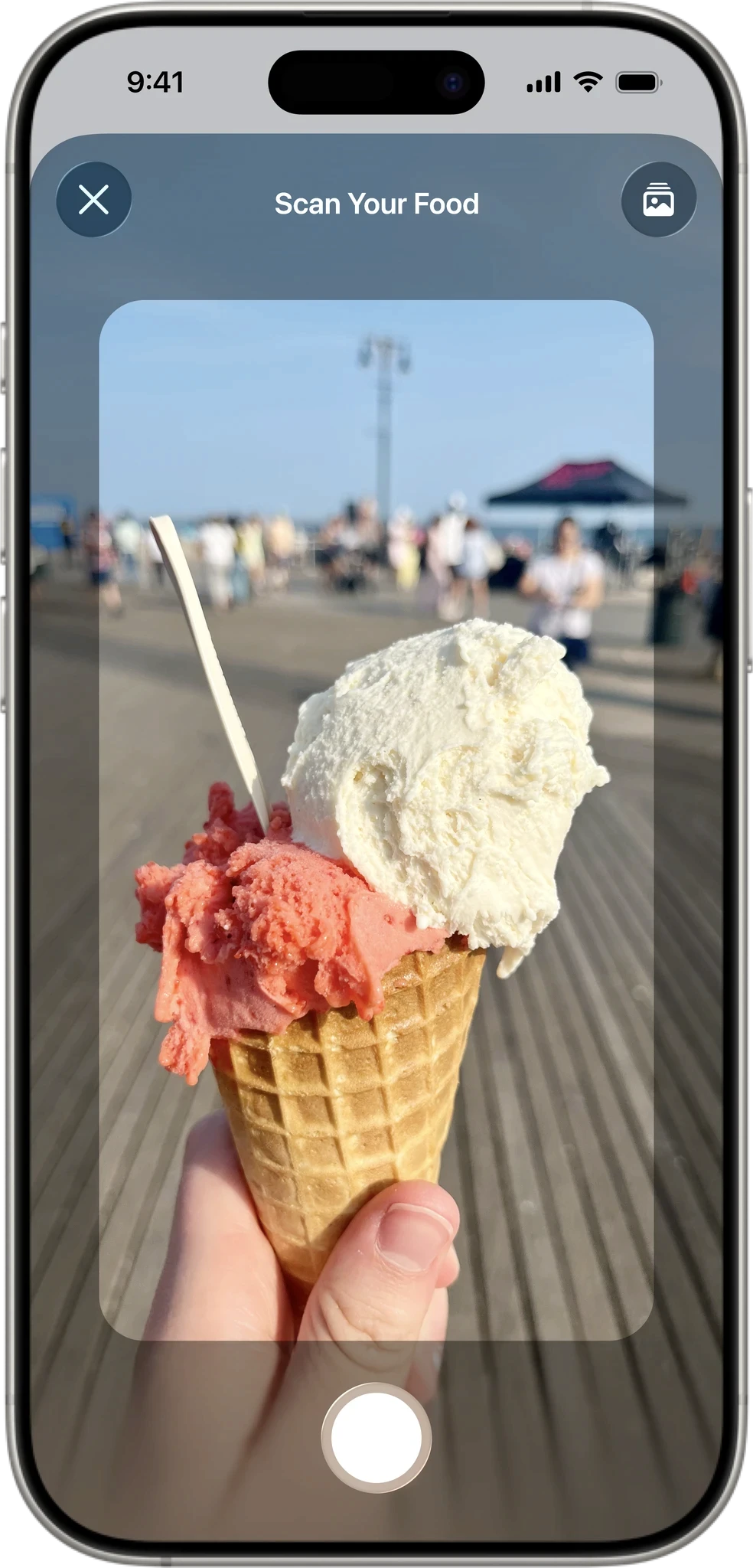 Scanning food with Foodnoms app camera to log meals and track nutrition automatically