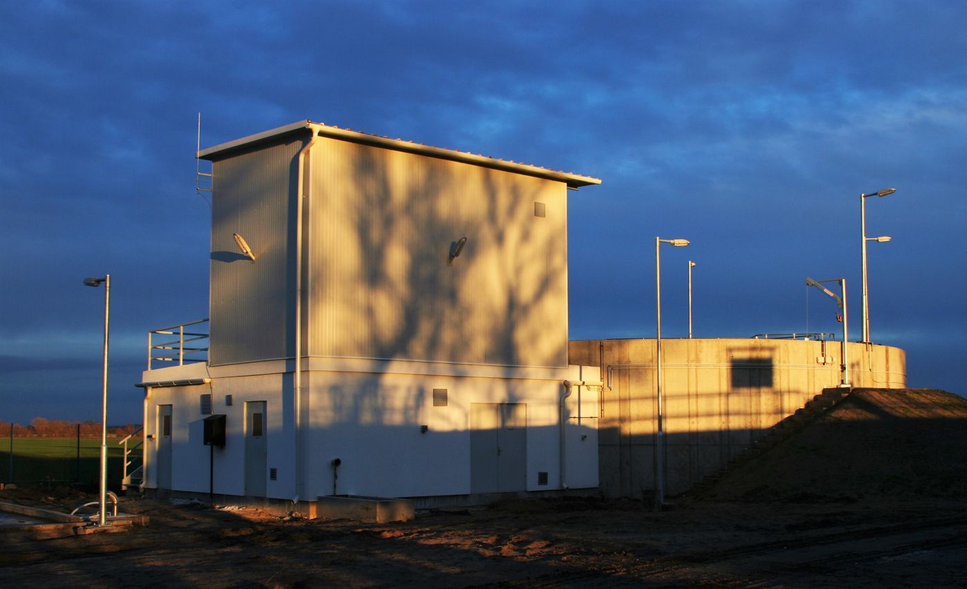 Plant building at dusk at the Ópusztaszer wastewater treatment plant, Hungary