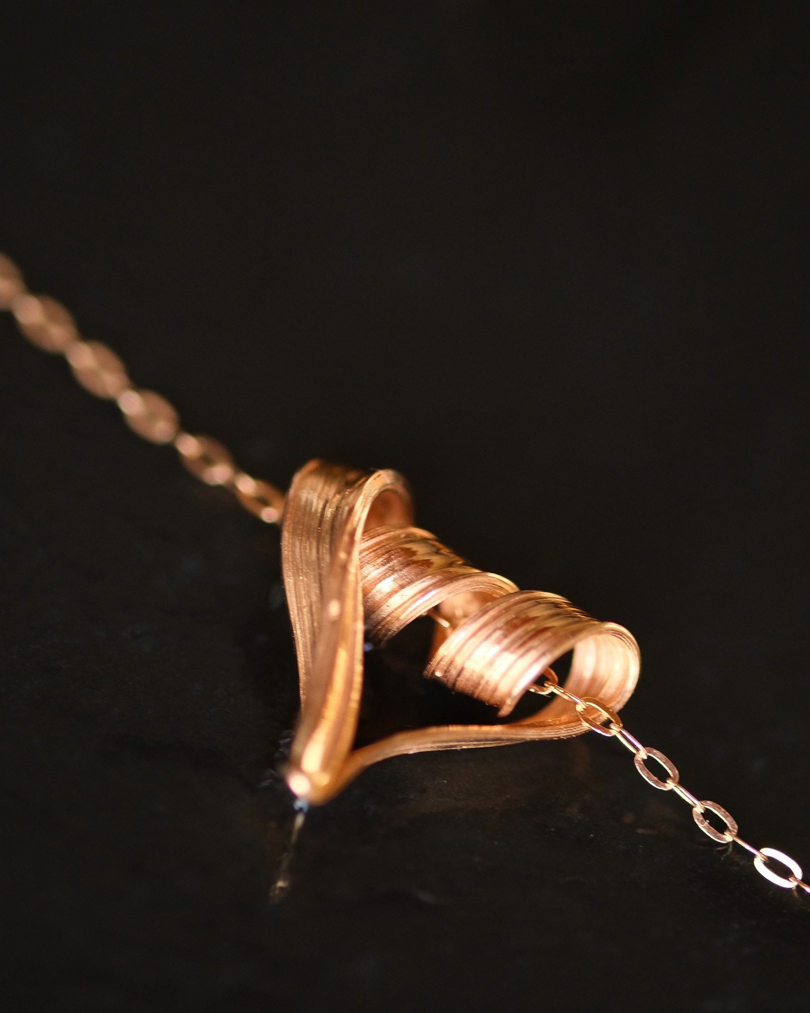 Textured heart pendant in rose gold