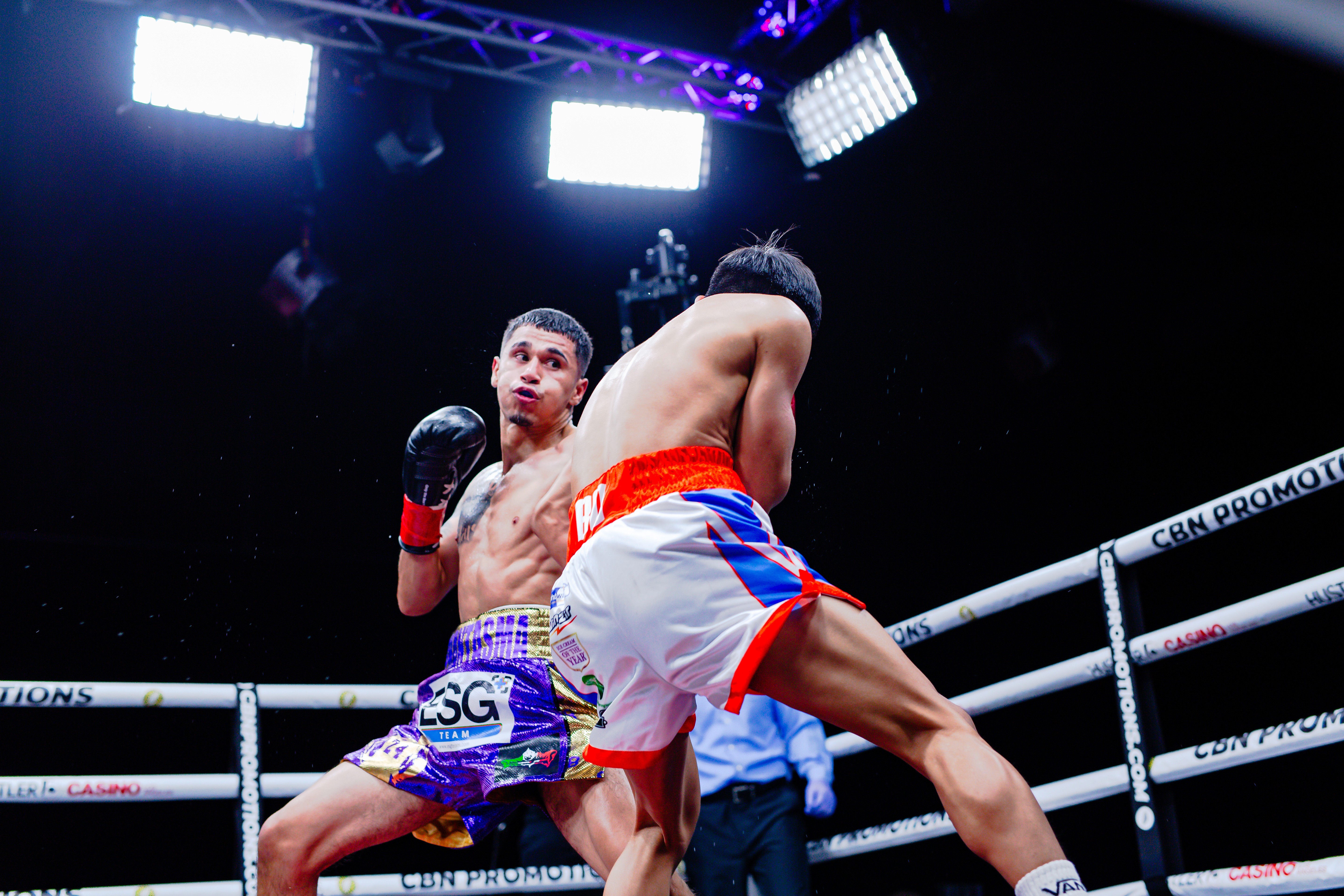 George "El Phantasma" Navarro landing a left hook to the body during the fight.