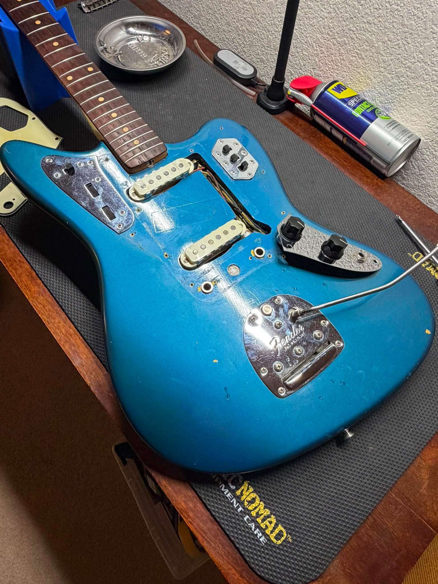 1963 Fender Jaguar disassembled, Lake Placid Blue visible in the control cavities