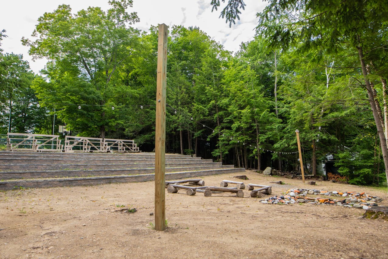 Outdoor amphitheater and campfire area at Camp Lenox