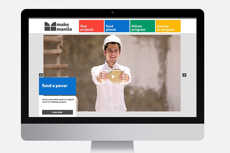 A computer screen displays the Make Manila website. The website features a navigation bar with options including "find projects," "fund pieces," "follow progress," and "partner or propose." A video player shows a young man in a white shirt holding a tablet. A blue banner reads "fund a paver," accompanied by a description: "Fund a permeable paver to support the E-11 Walkway project." A "FUND NOW" button is visible below the video.