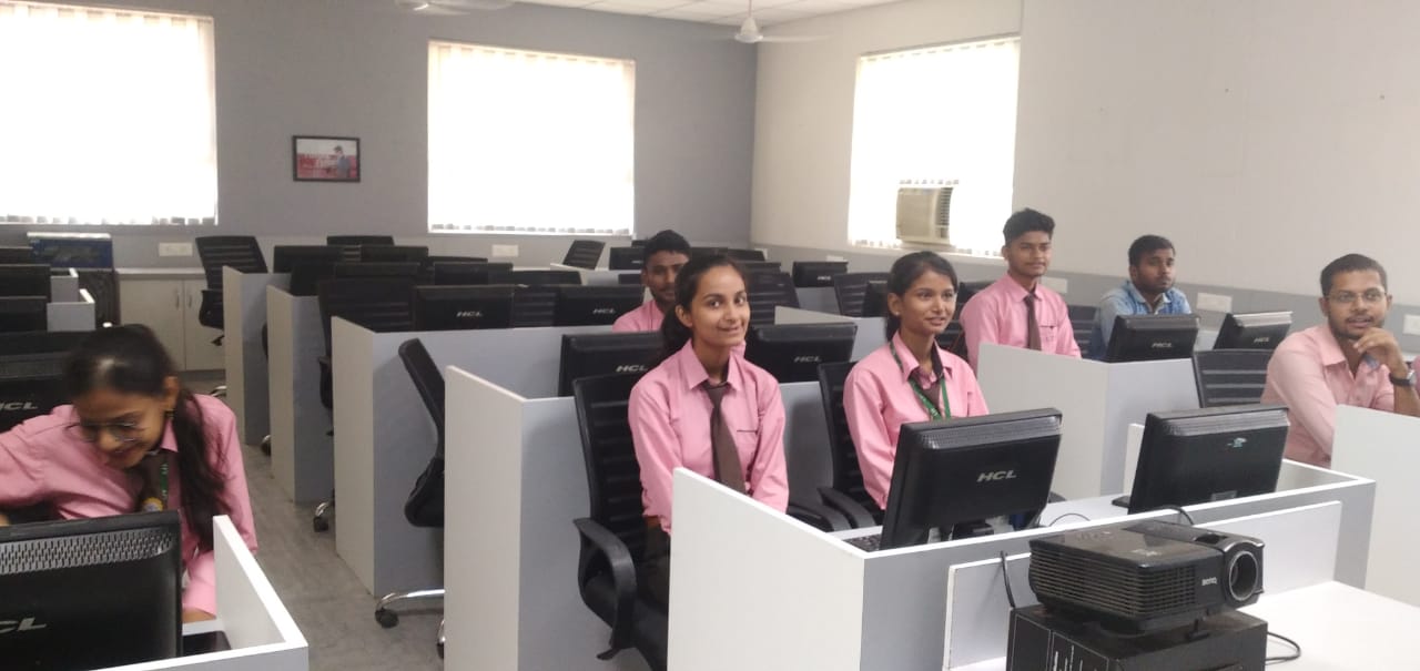 Full moon rising behind a house at night