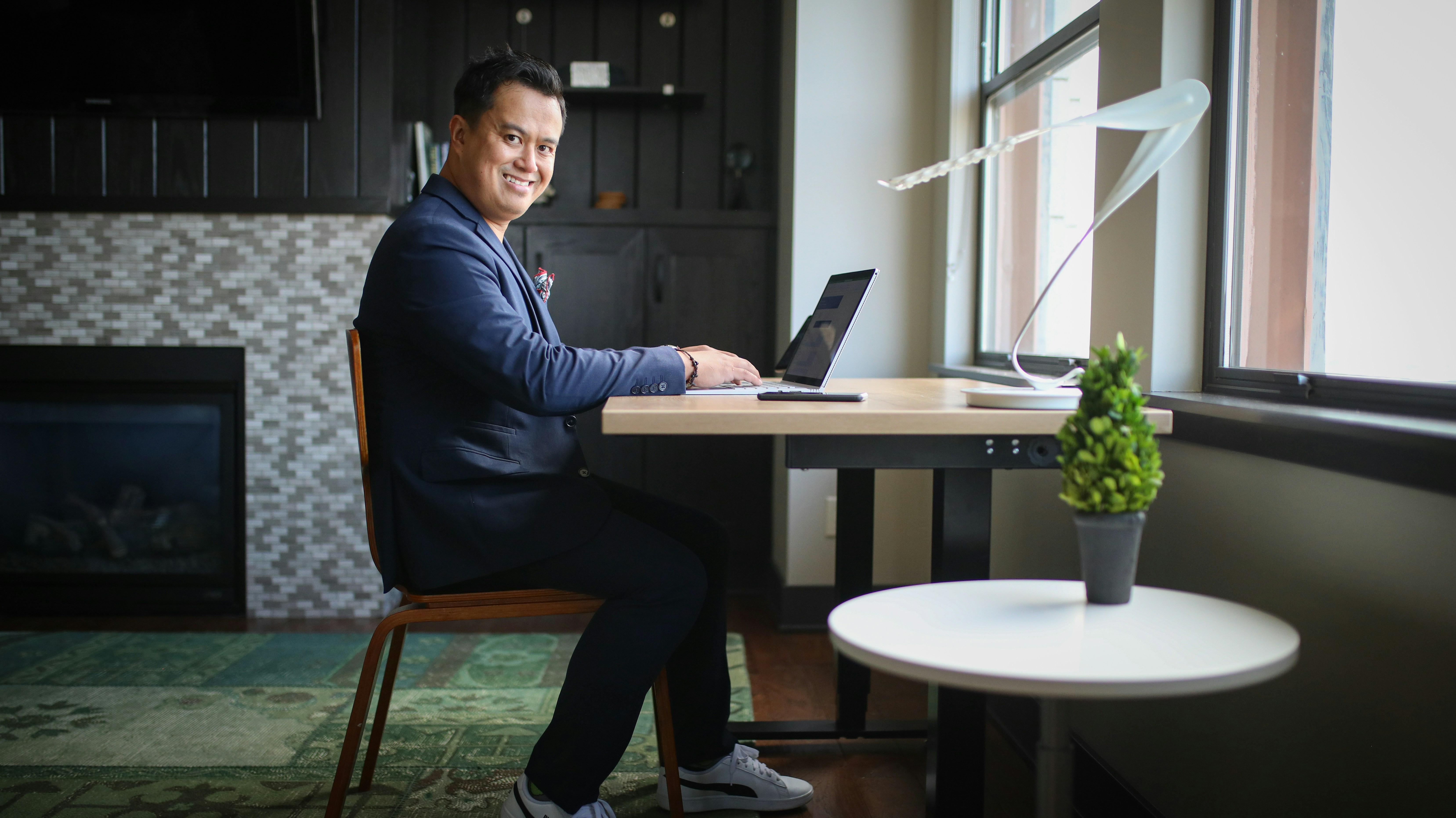 man sitting on desk implementing Spreadsheet Tips