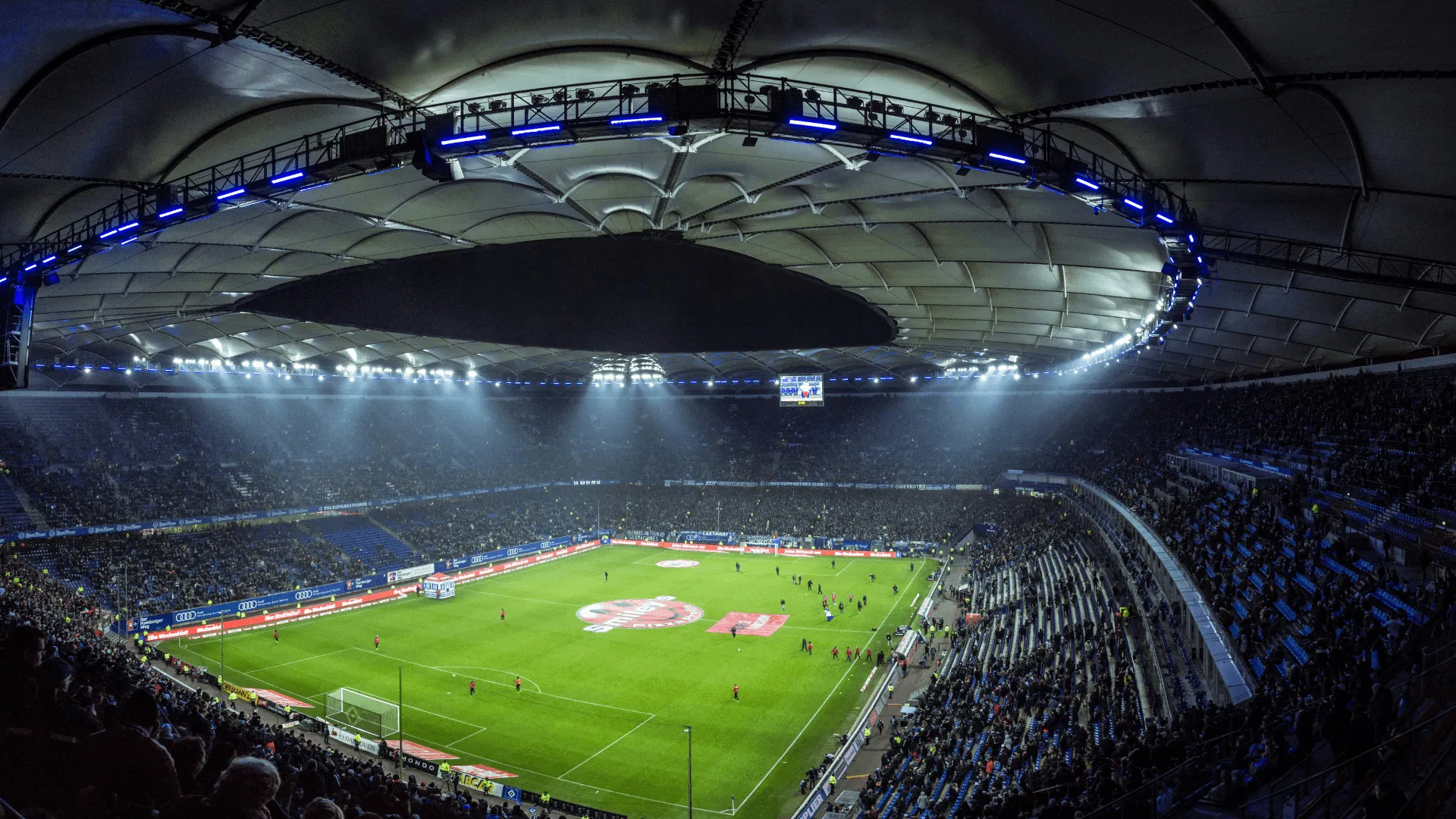 A wide shot of a football stadium