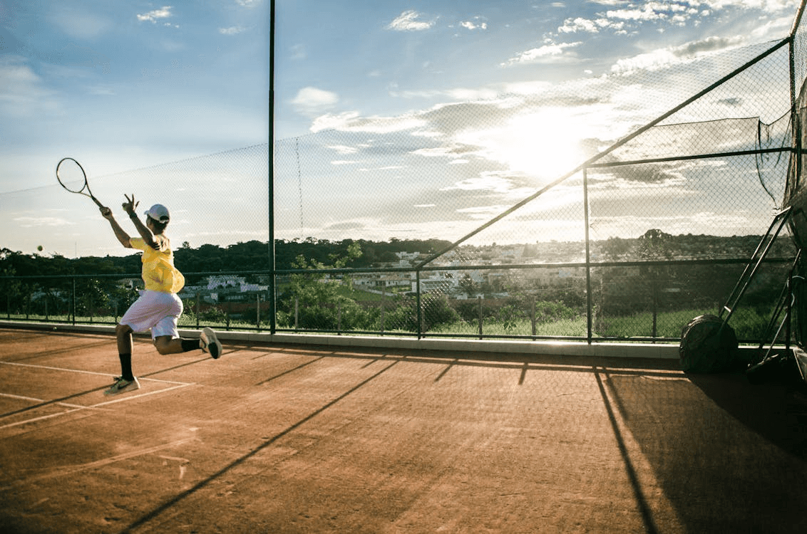 Adult playing tennis