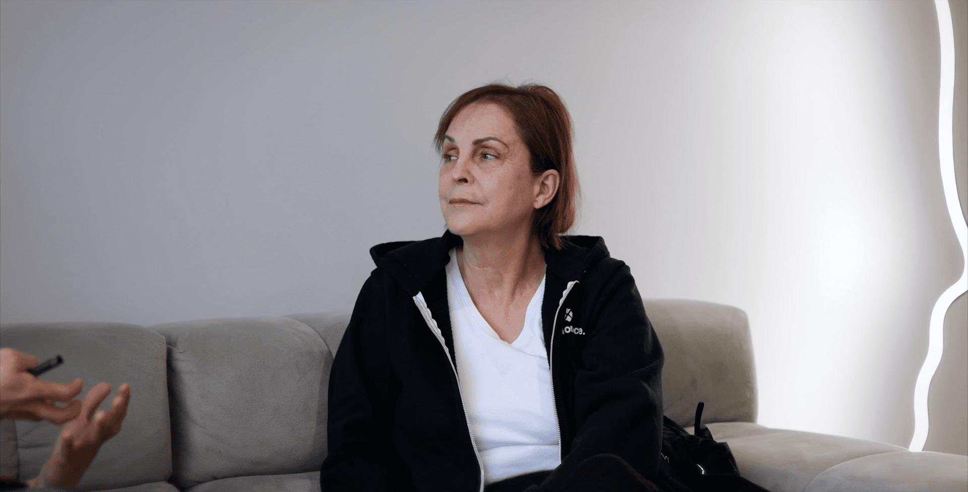 Cliente discutant avec Dr Alex avant le traitement