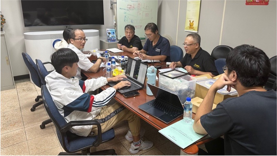 white microscope on top of black table