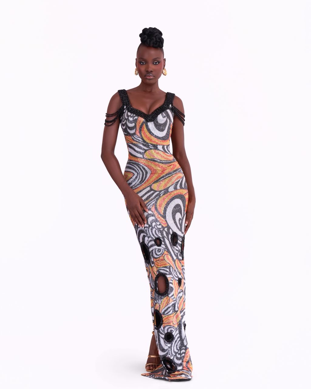 Woman wearing a patterned dress on a white background