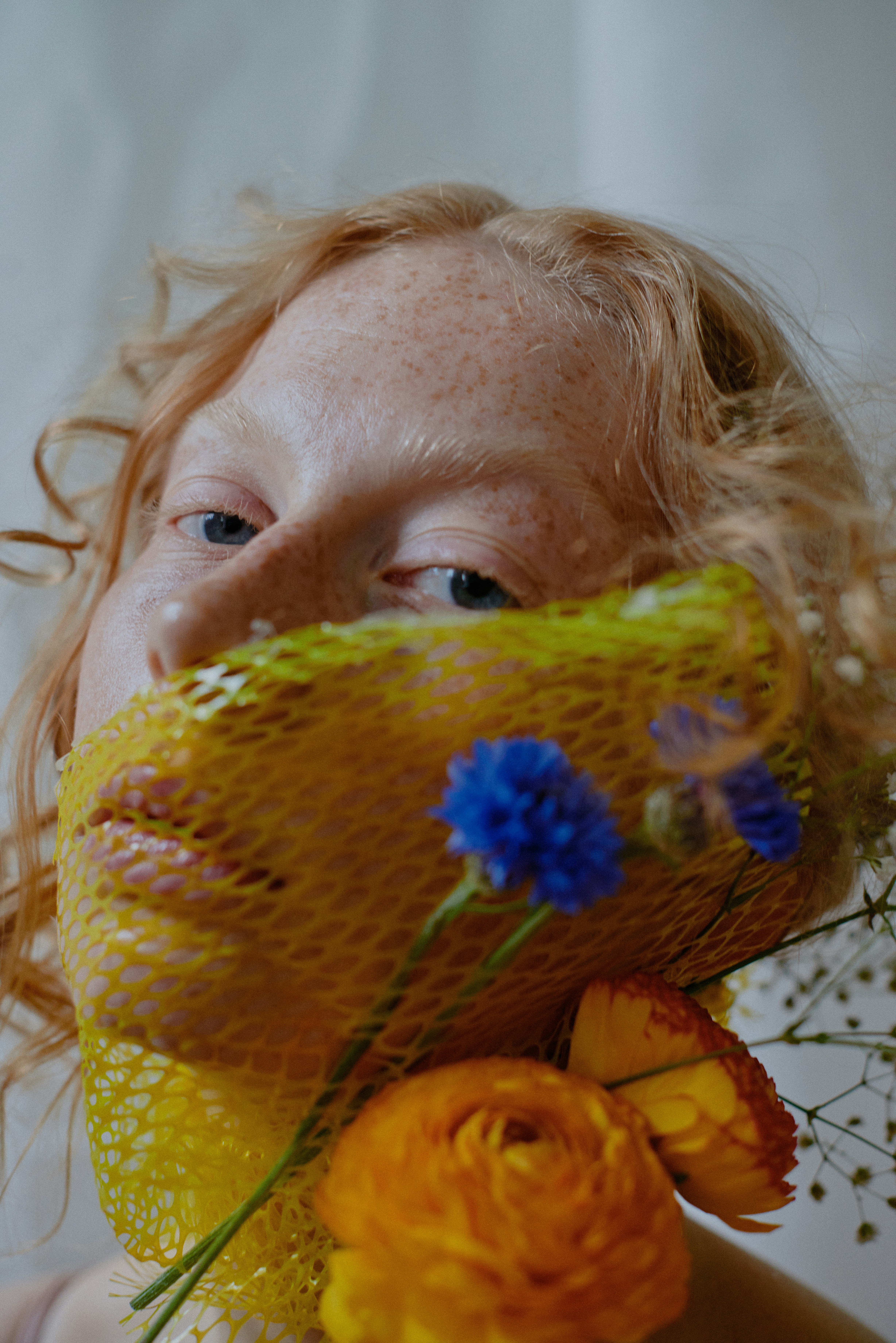 woman holding a bouquet of flowers