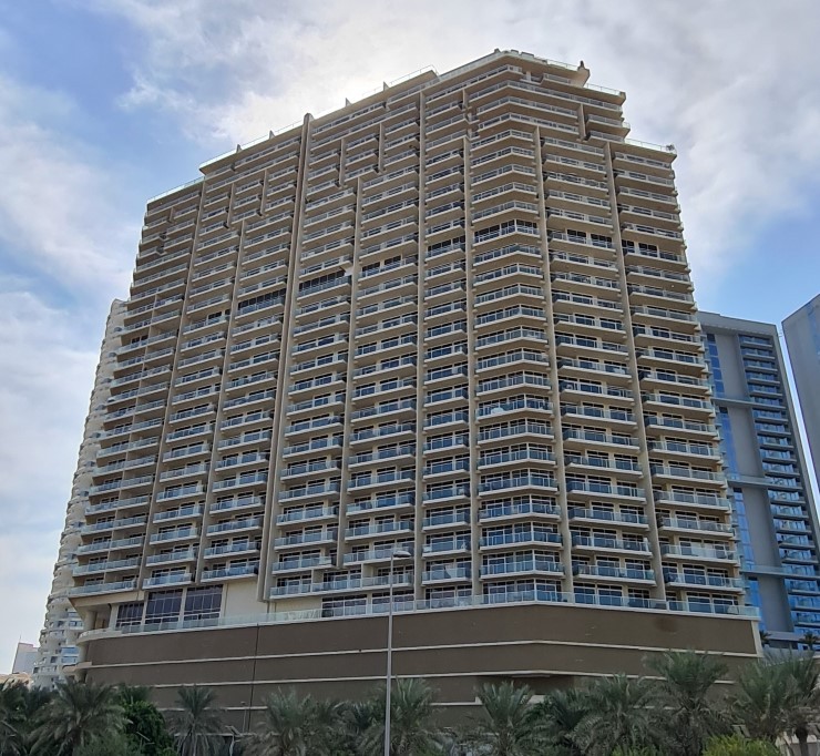 Luxury residential facade at Zaya Hameni. Professional real estate services for buyers and investors.