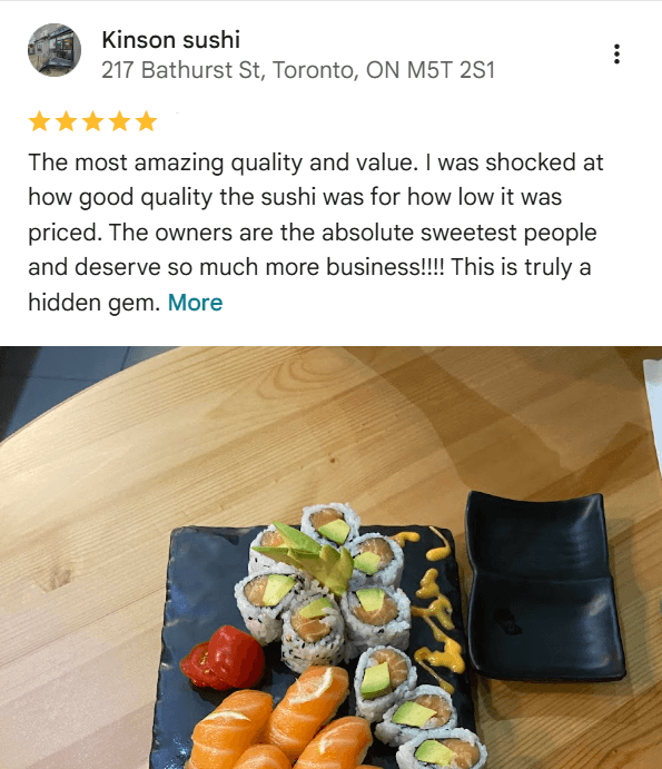 a group of people walking on a sidewalk