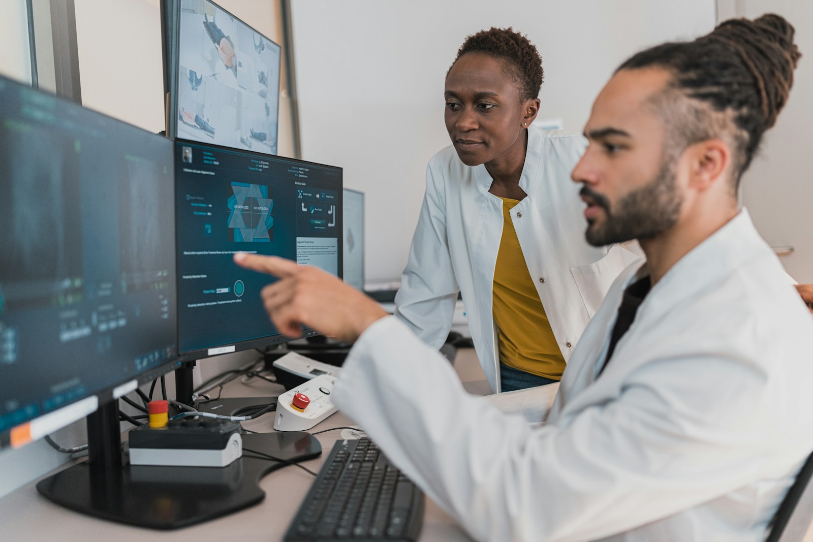 Healthcare team reviewing analytics and social media performance on a desktop dashboard