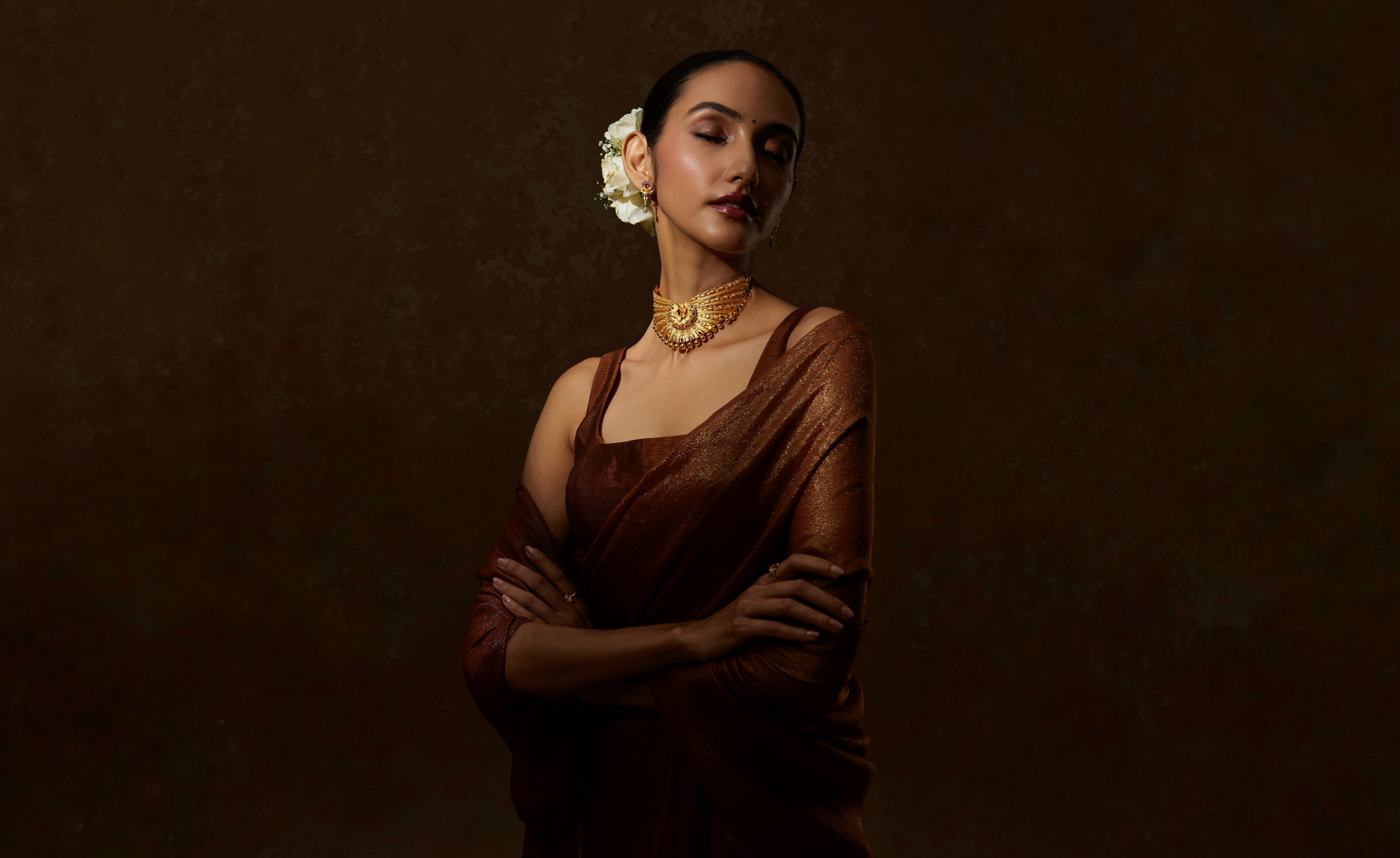 Friends laughing and posing inside a car