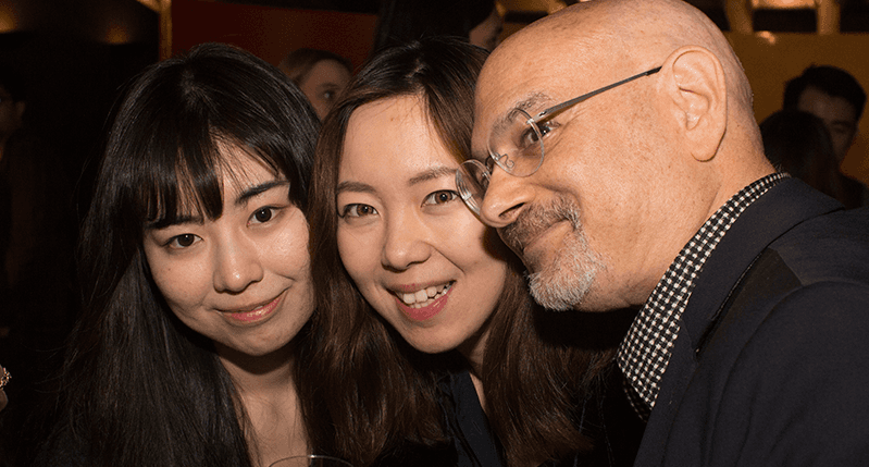 group photo of an older man and two younger women