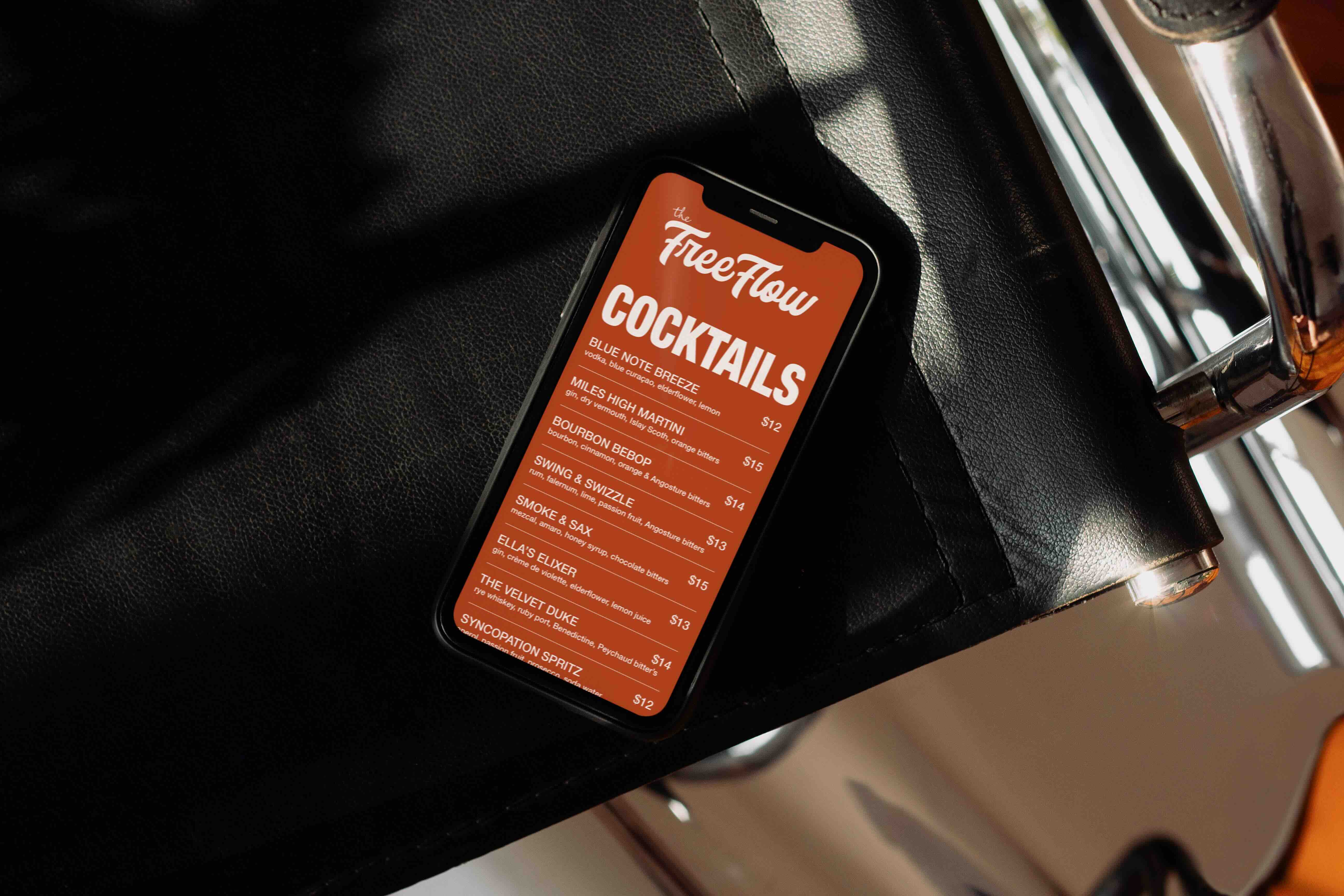 Branded menu on mobile for The Free Flow cocktail bar