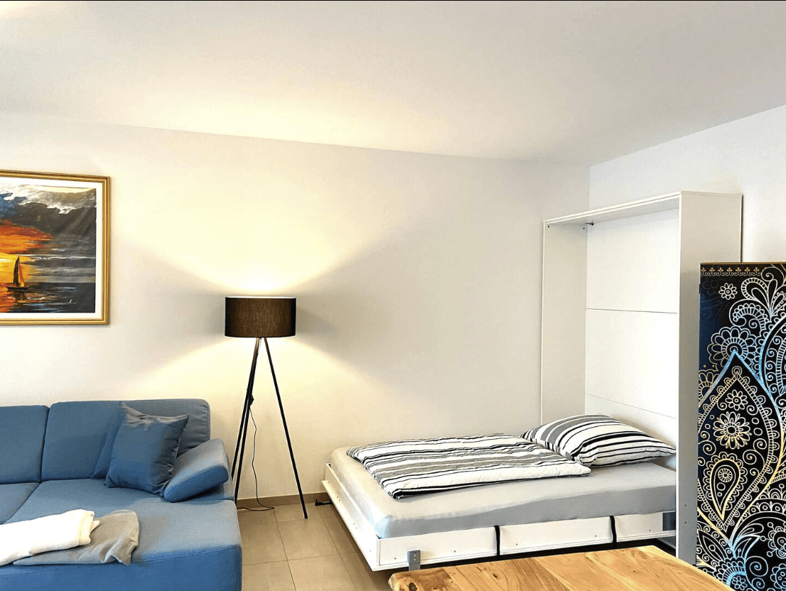 Ferienwohnung Markgrafenheide Wohnzimmer mit Bett