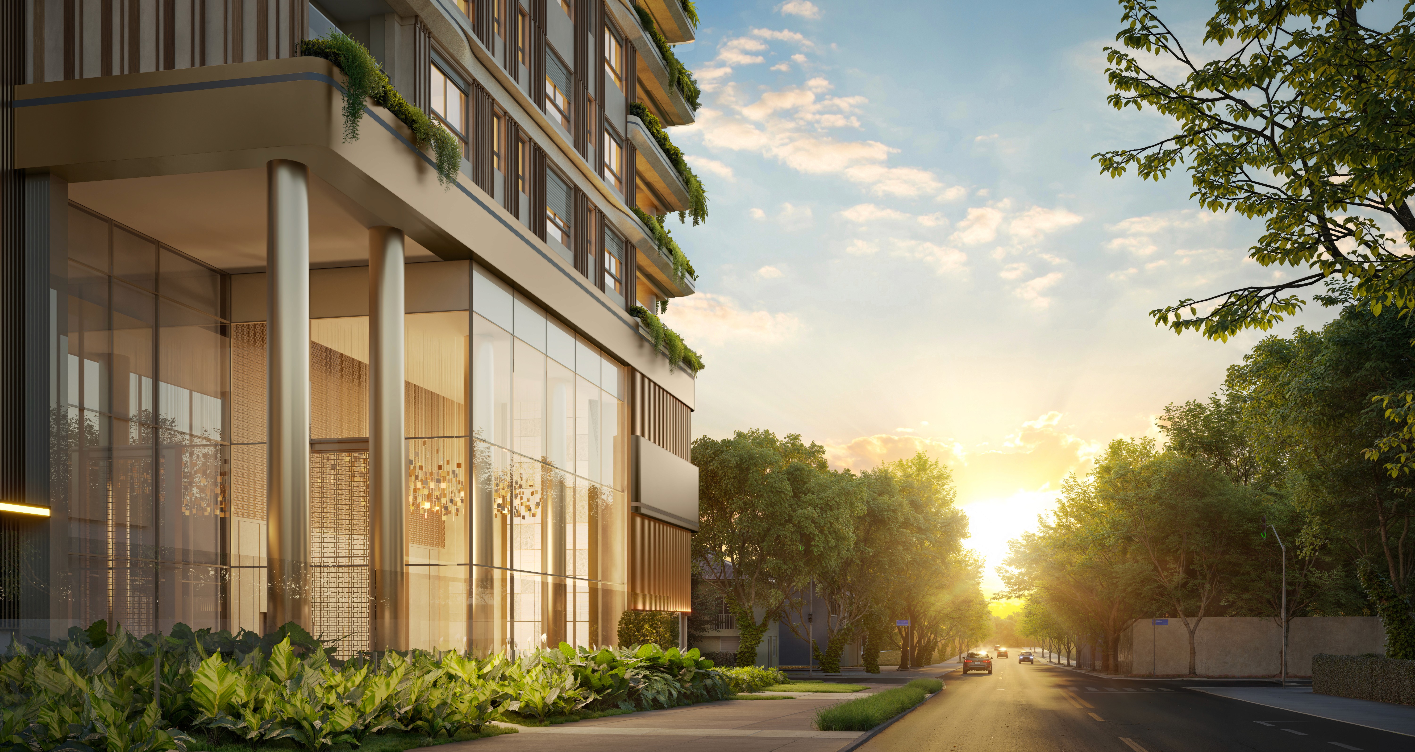 Curved modern skyscraper against a clear blue sky.