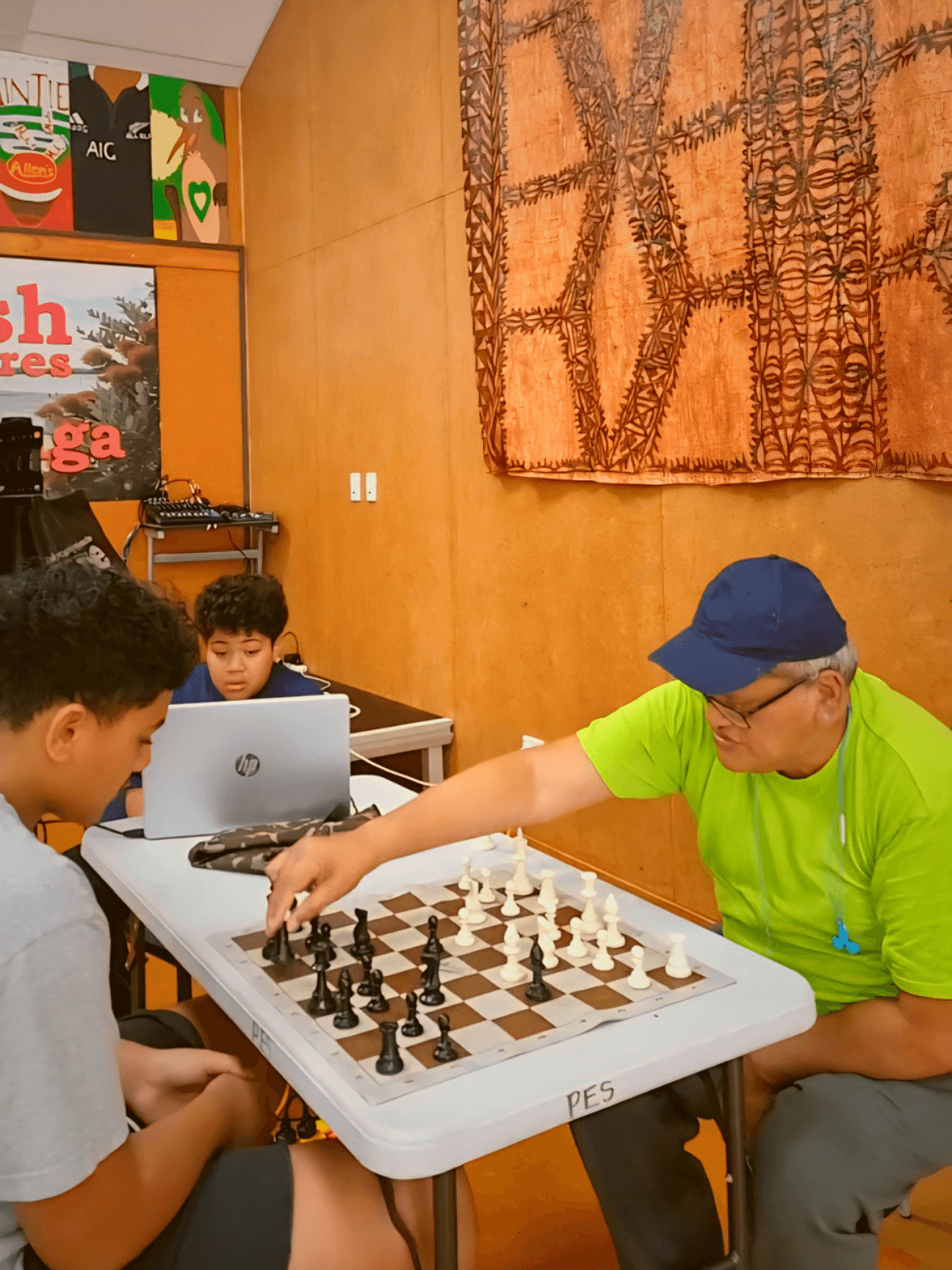 Old and Young generation playing chess